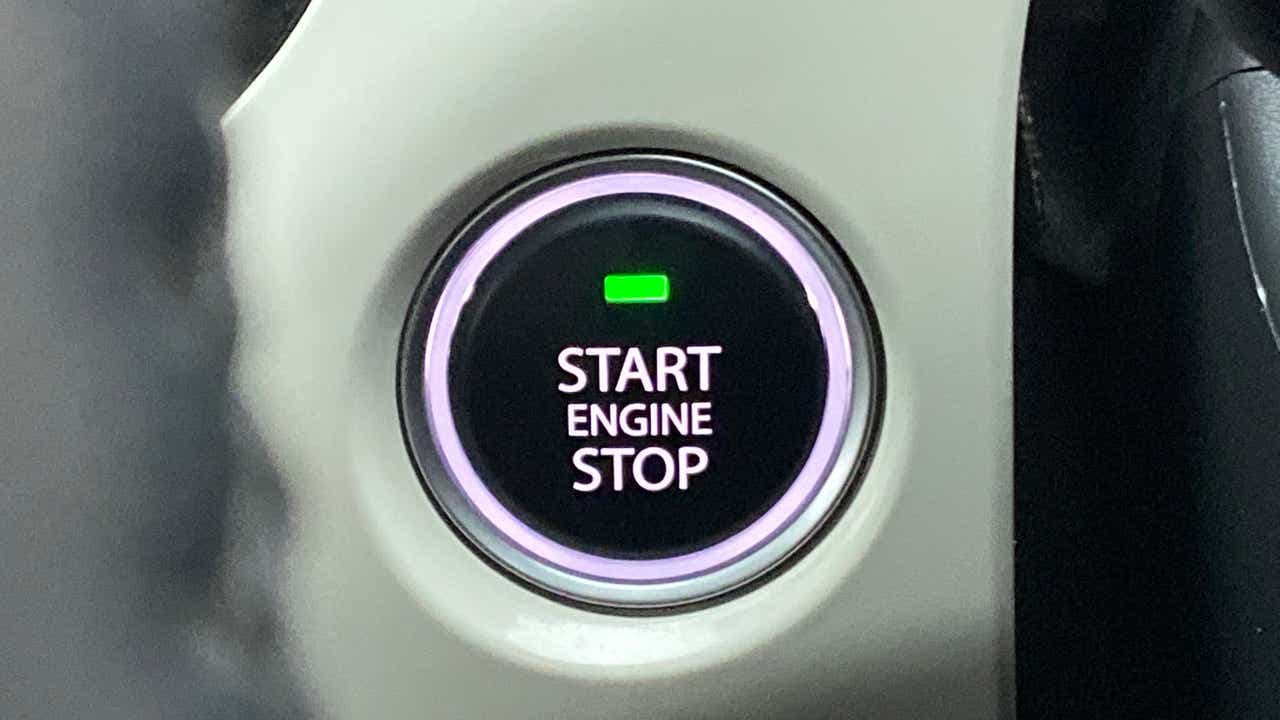 Close-up of engine start stop button in a Tata Nexon 2017-2023