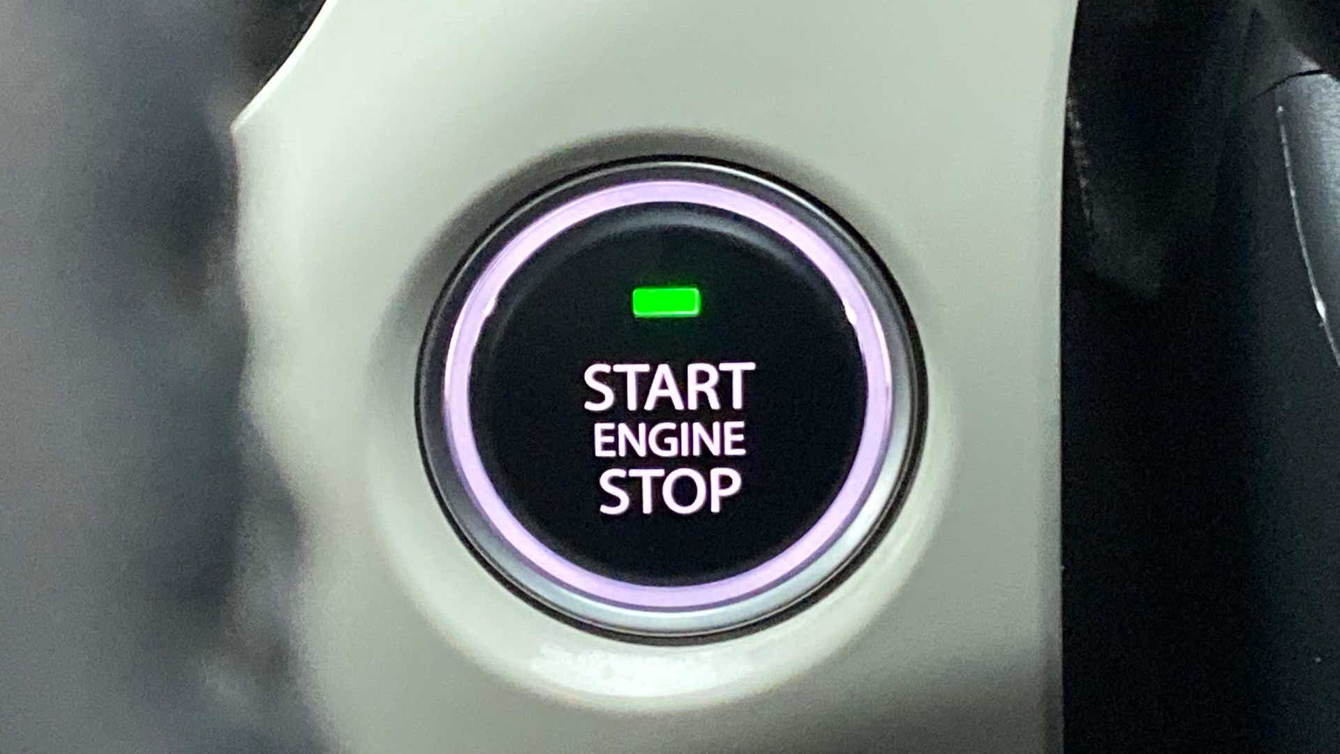 Close-up of engine start stop button in a Tata Nexon 2017-2023