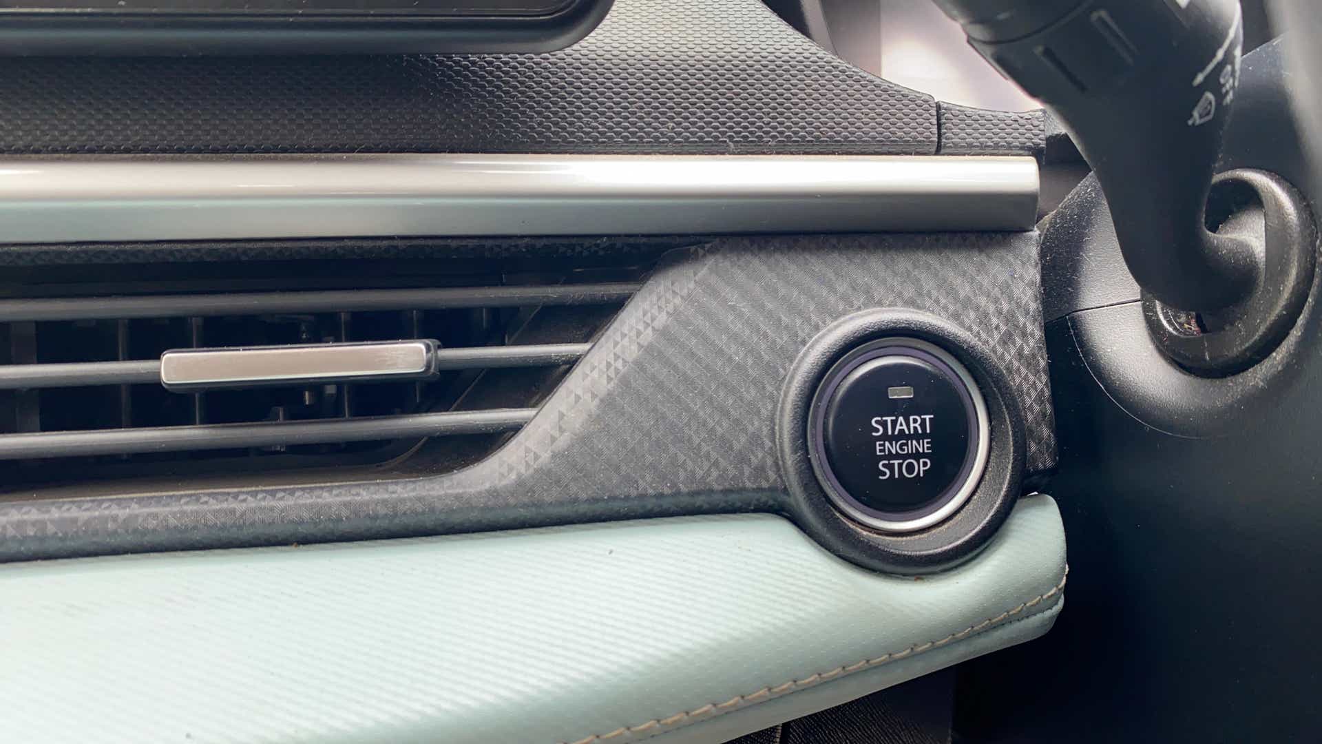 Dashboard start button view of a Tata Nexon