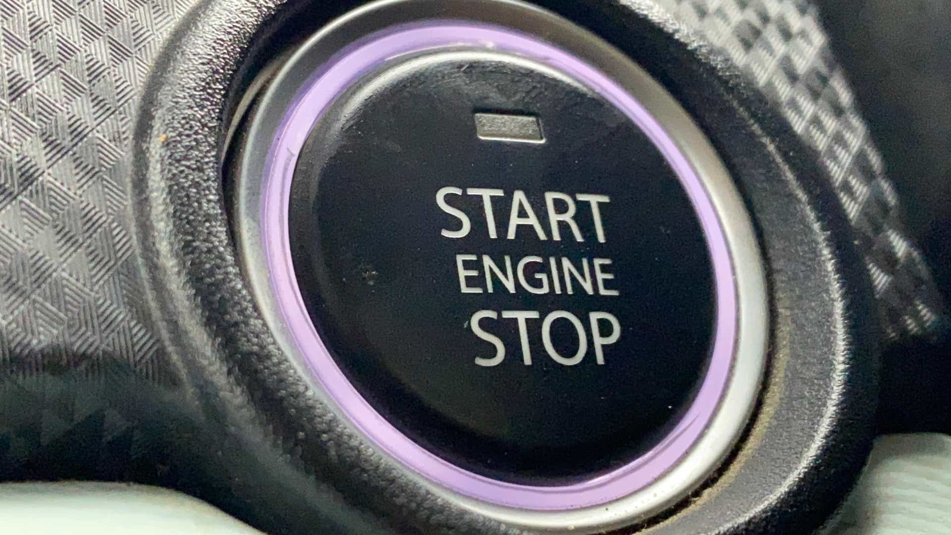 Close-up of the start engine stop button in a Tata Nexon 2017-2023