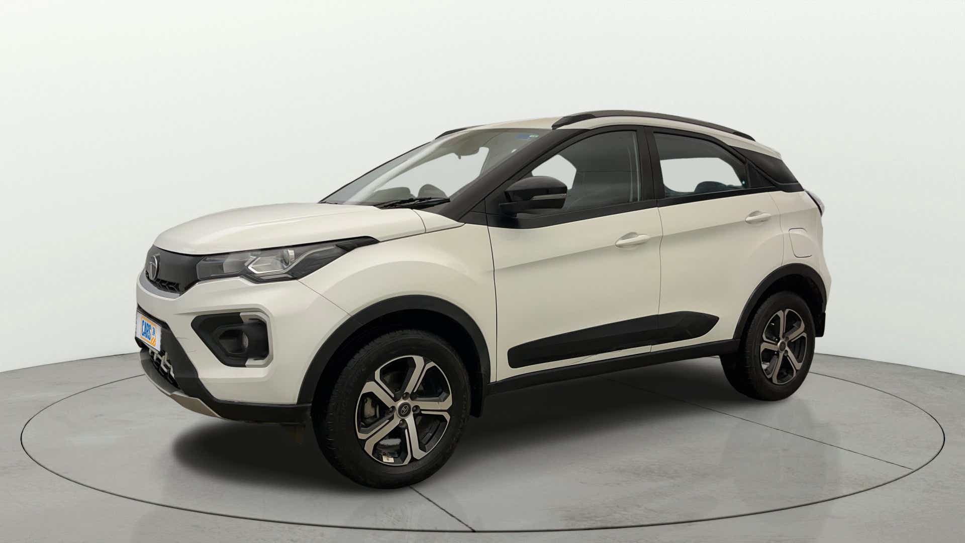 Front side view of a Calgary White Tata Nexon 2017-2023