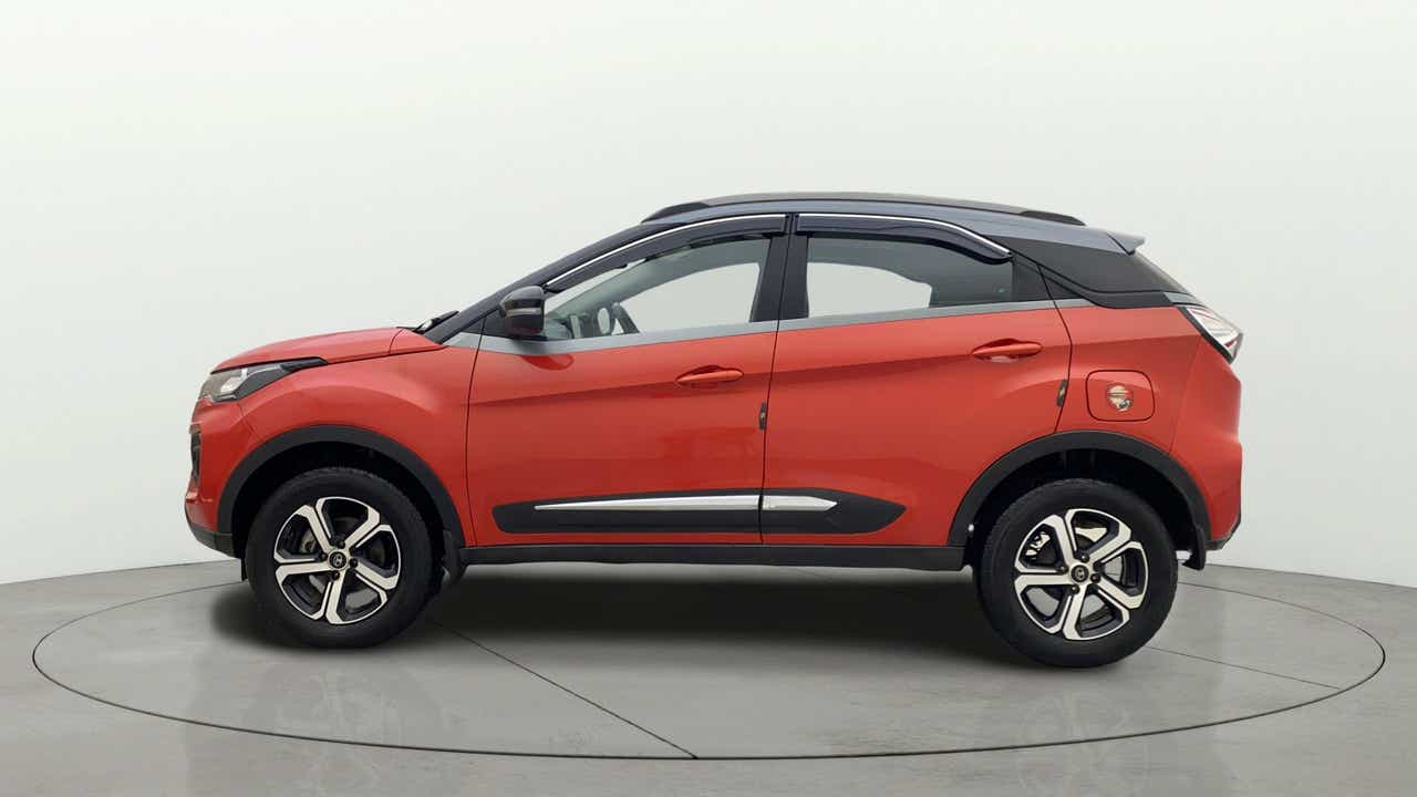 Side view of a Flame Red Tata Nexon 2017-2023