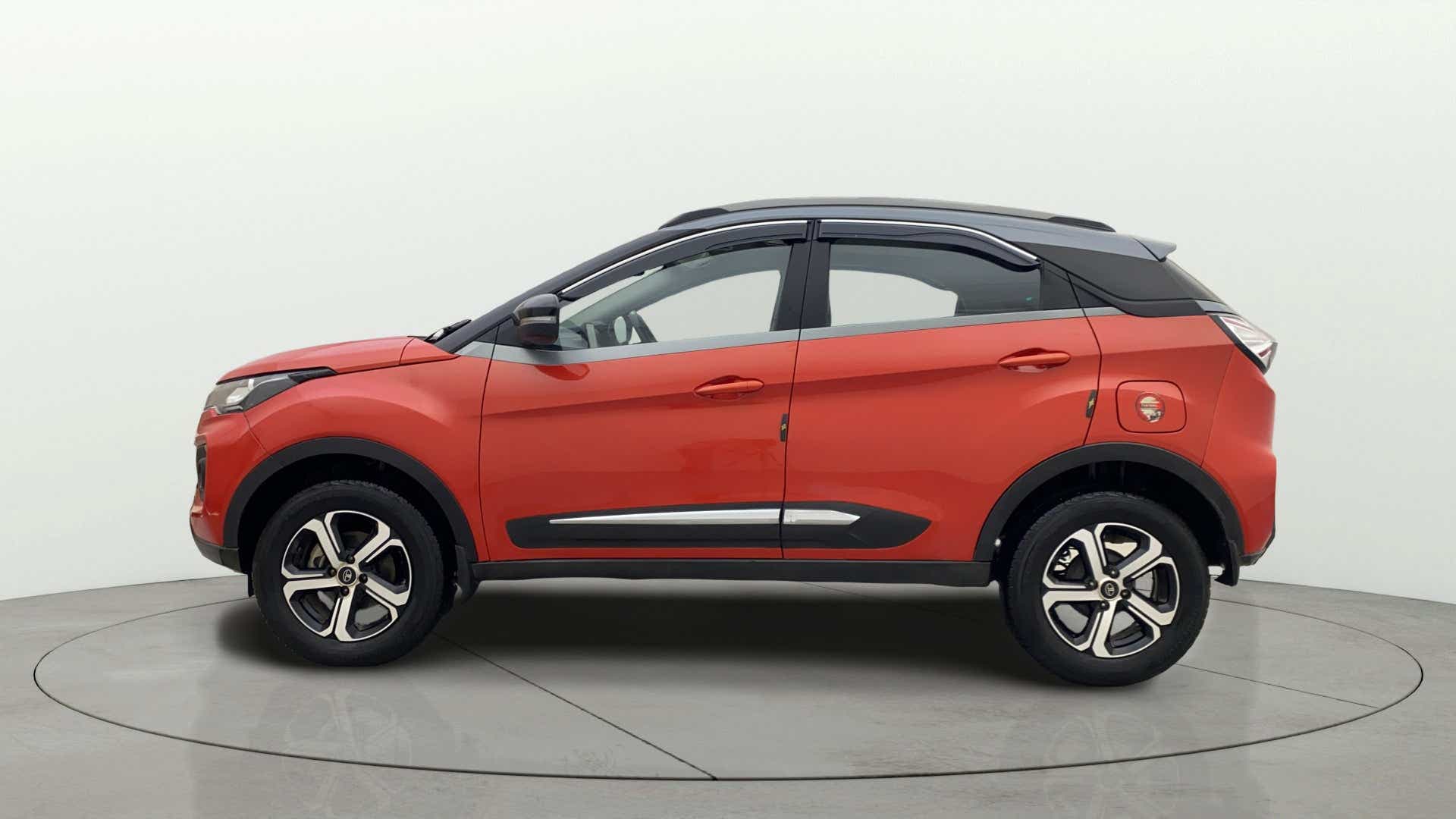 Side view of a Flame Red Tata Nexon 2017-2023