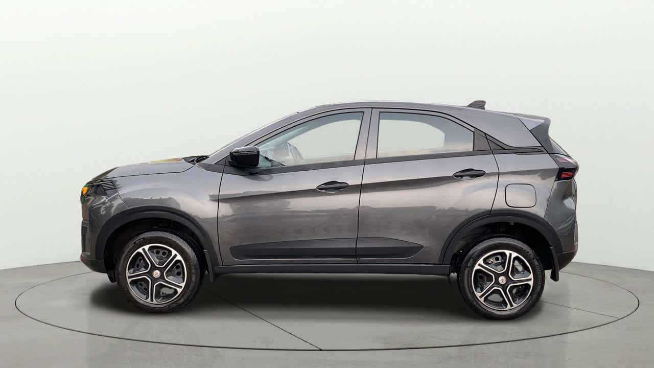Side view of a daytona-grey Tata Nexon