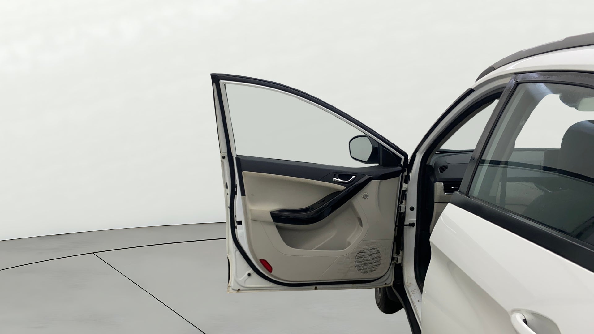 Front driver side door open view of a Tata Nexon 2017-2023