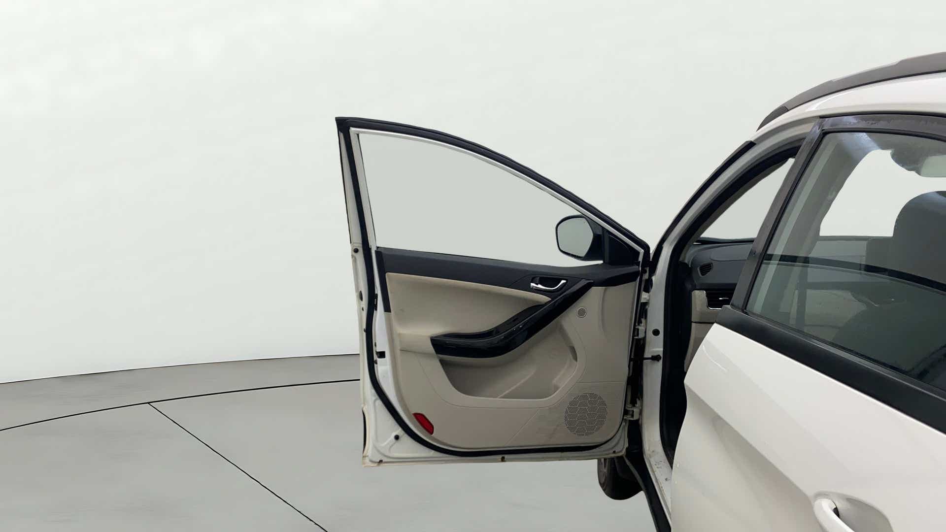 Front driver side door open view of a Tata Nexon 2017-2023