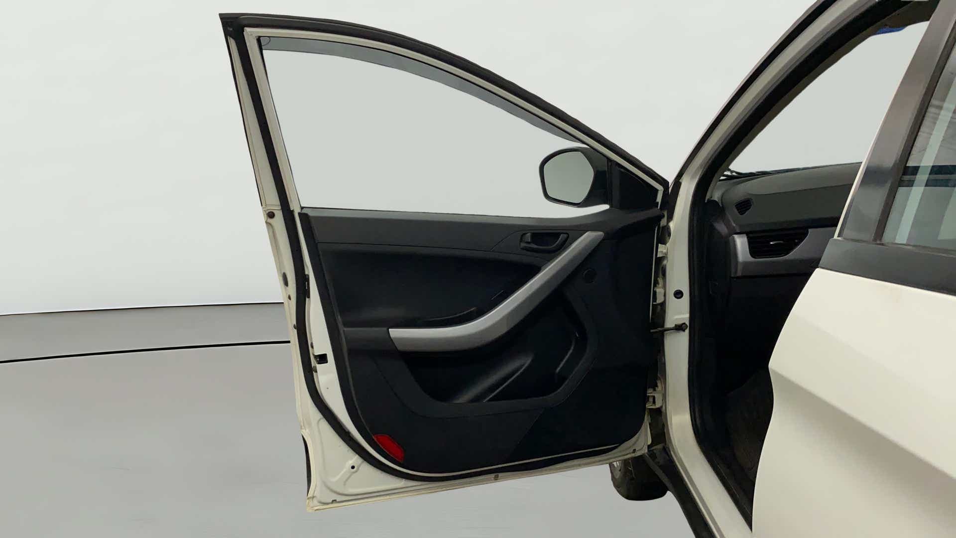Front driver side door open view of a Tata Nexon 2017-2023
