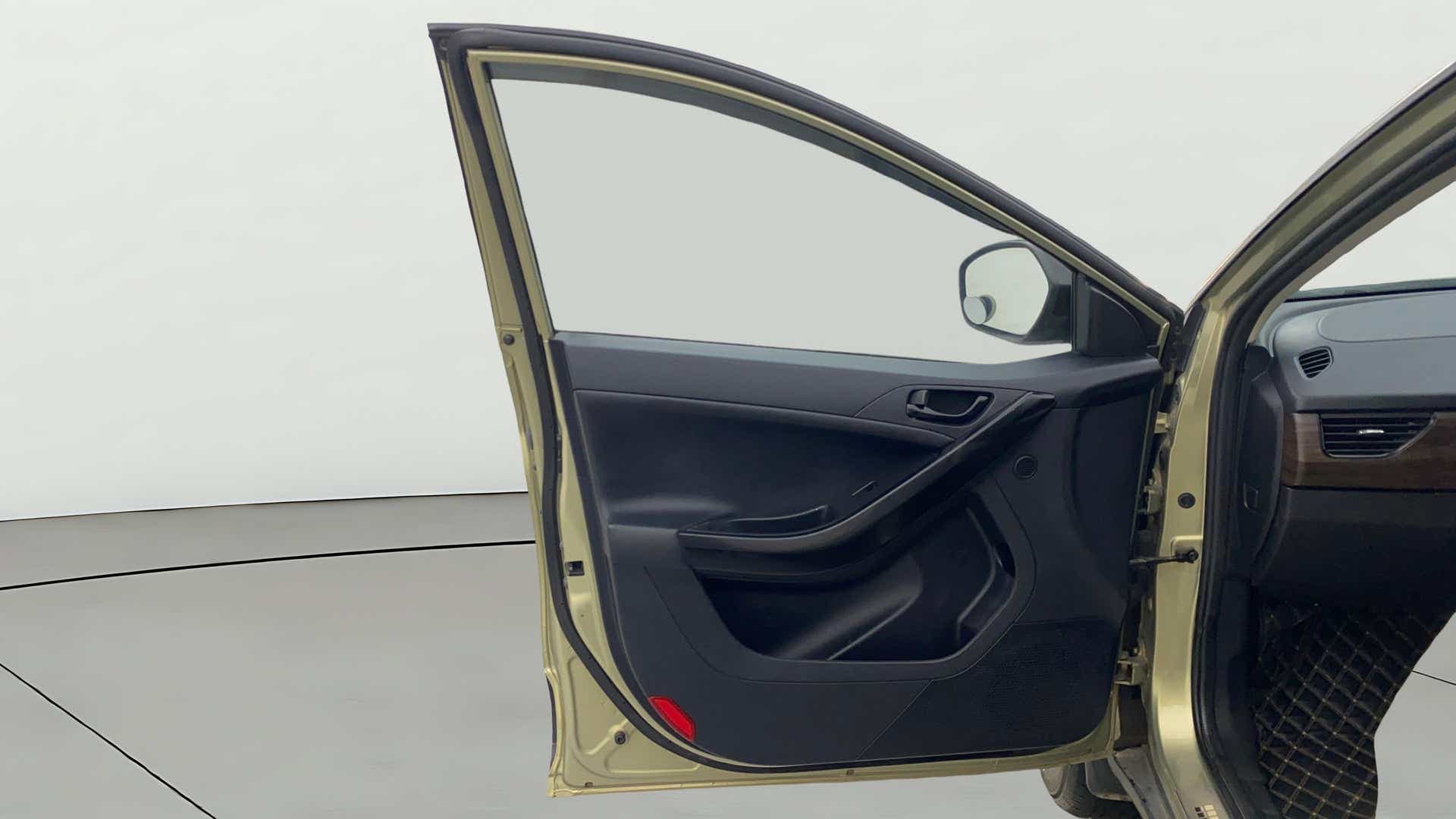 Front driver-side door interior of a Tata Nexon 2017-2023
