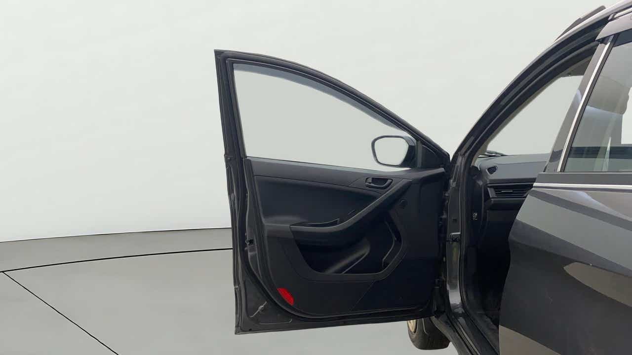 Front passenger door view of a Tata Nexon