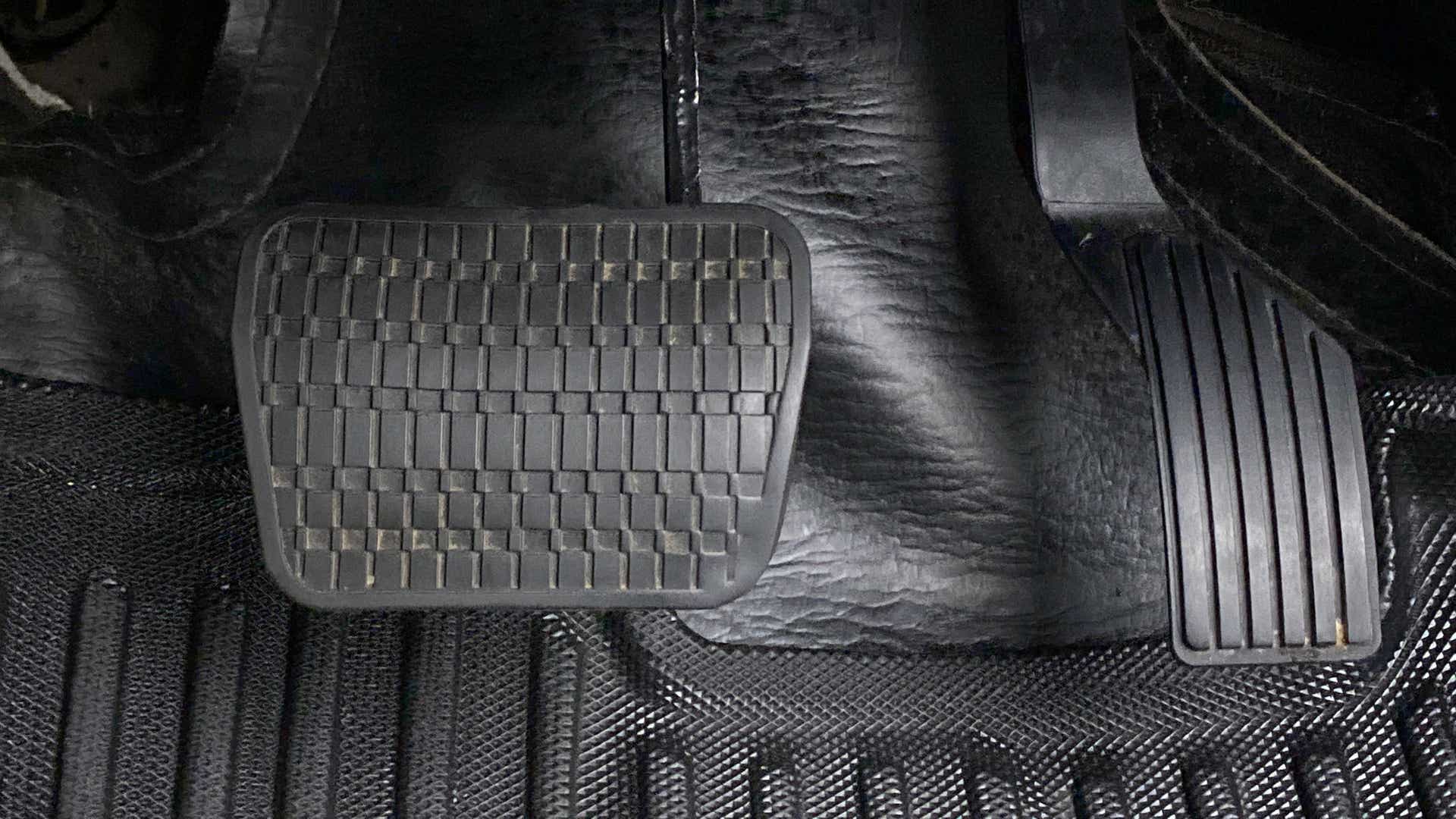 Close-up of the foot pedals of a Tata Nexon 2017-2023