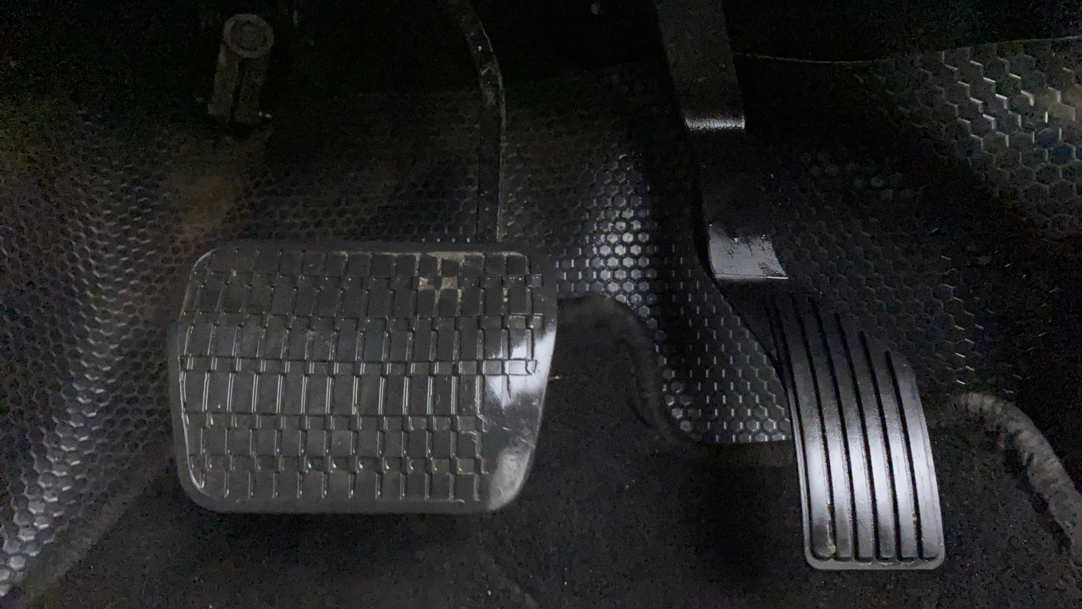 Close-up of foot pedals of a Tata Nexon 2017-2023