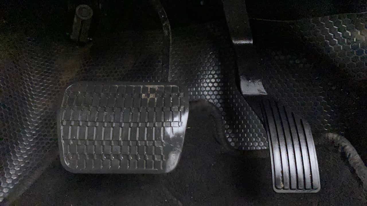 Close-up of foot pedals of a Tata Nexon 2017-2023