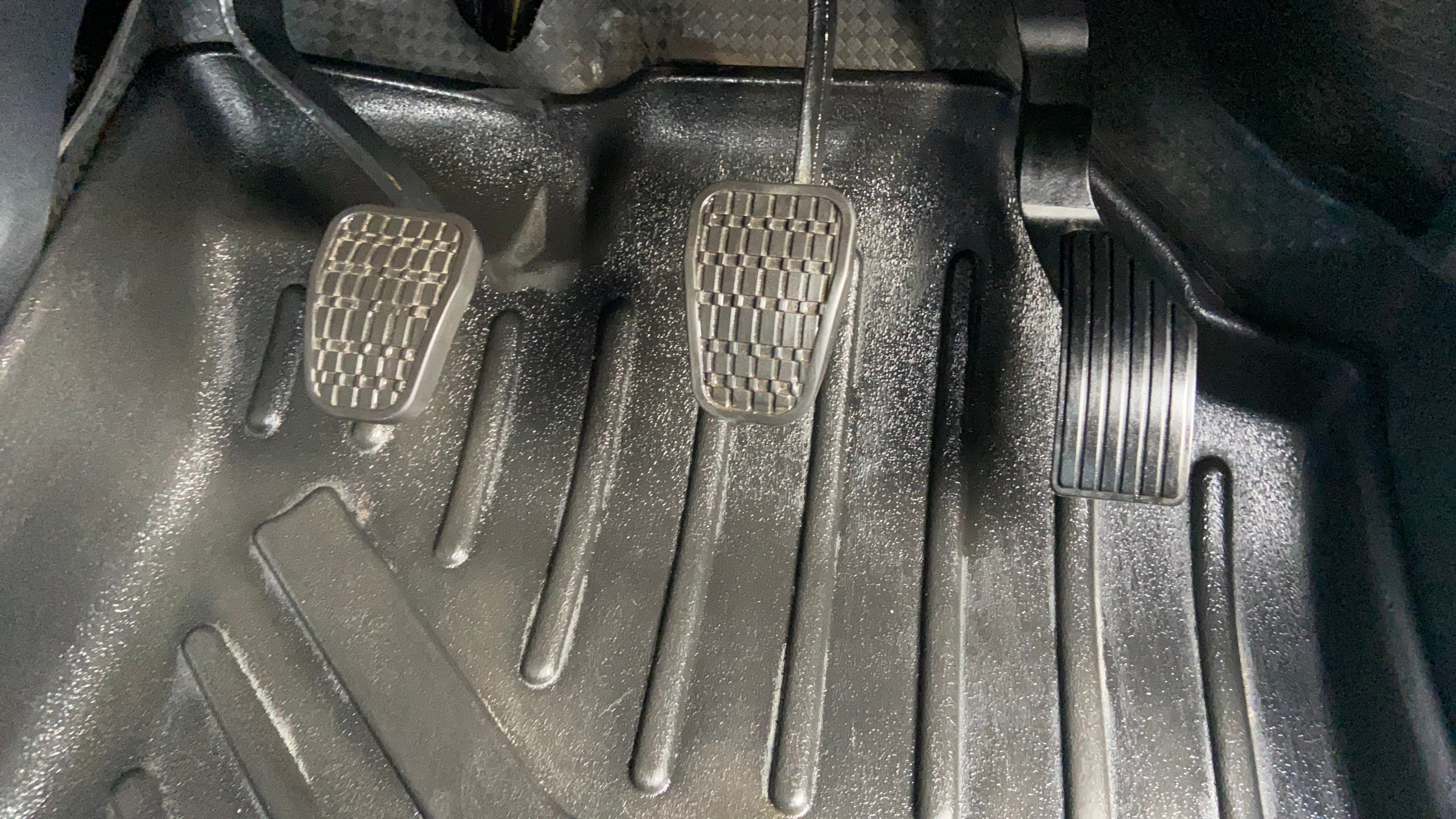 Foot pedals area of a Tata Nexon