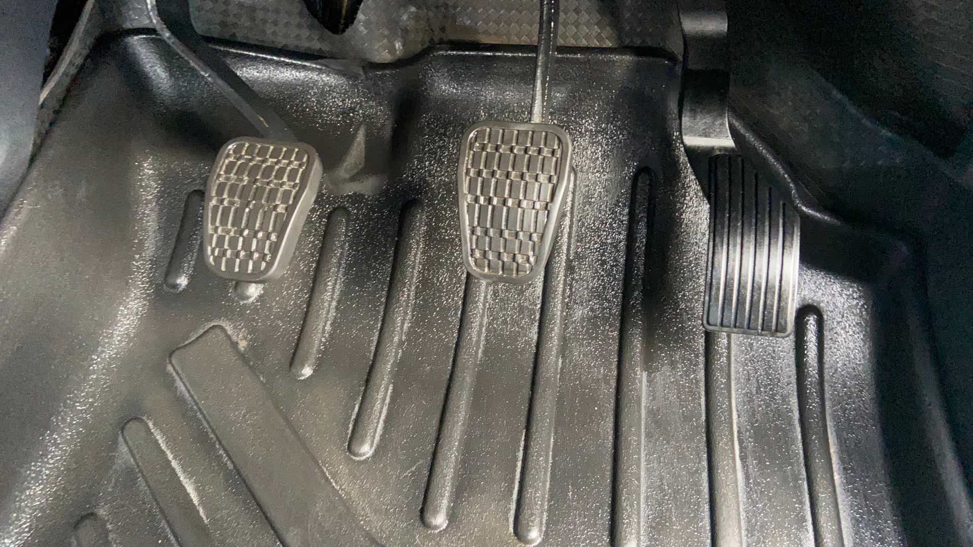 Foot pedals area of a Tata Nexon