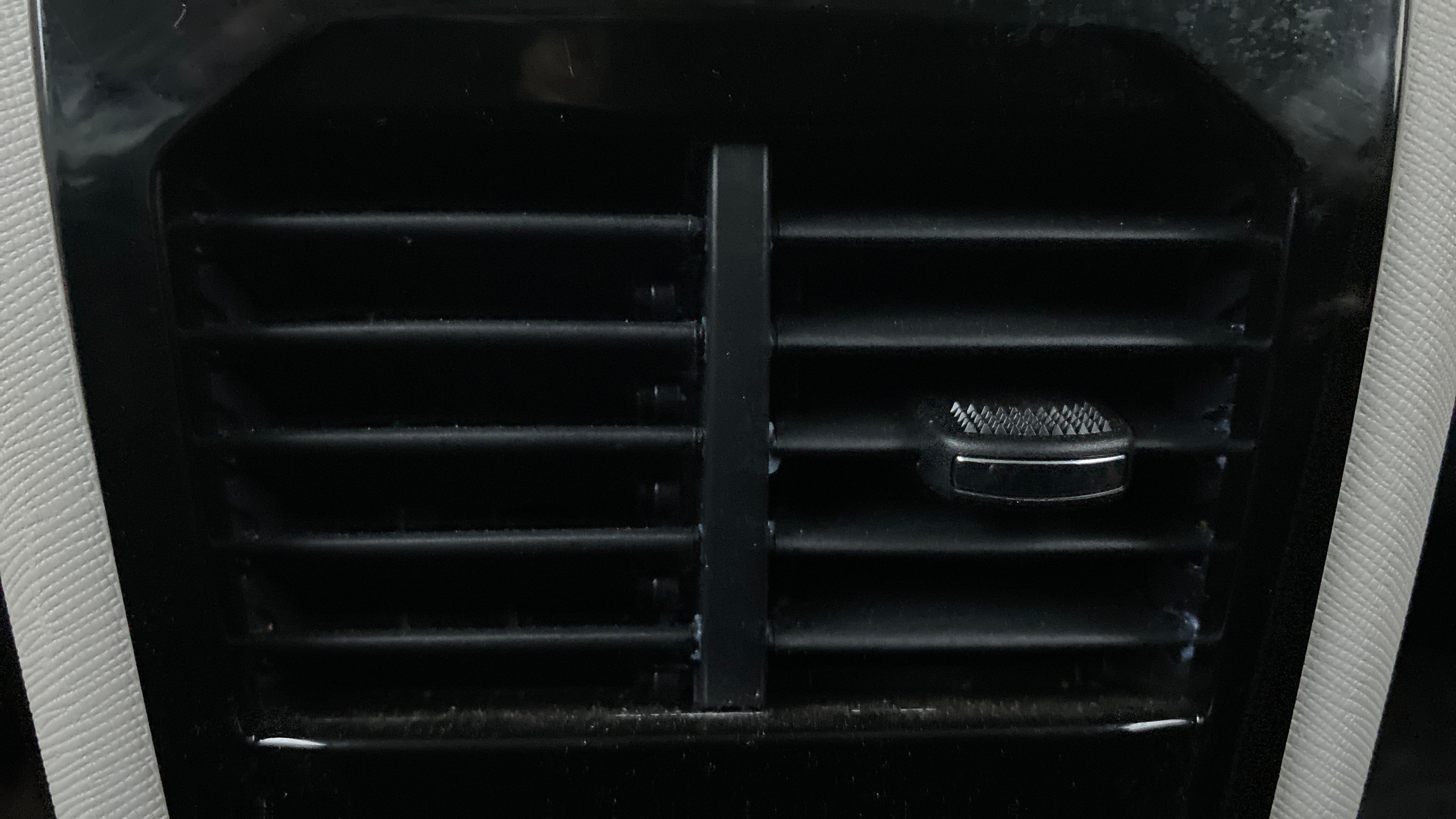 Close-up of an air conditioning vent of a Tata Nexon 2017-2023