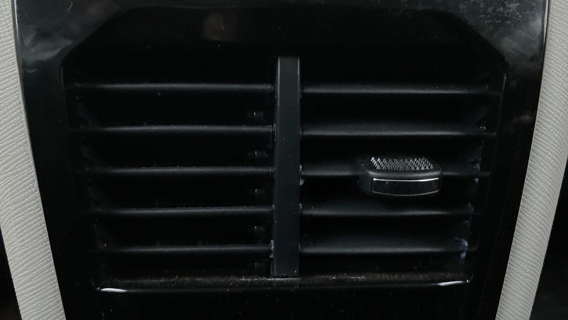 Close-up of an air conditioning vent of a Tata Nexon 2017-2023