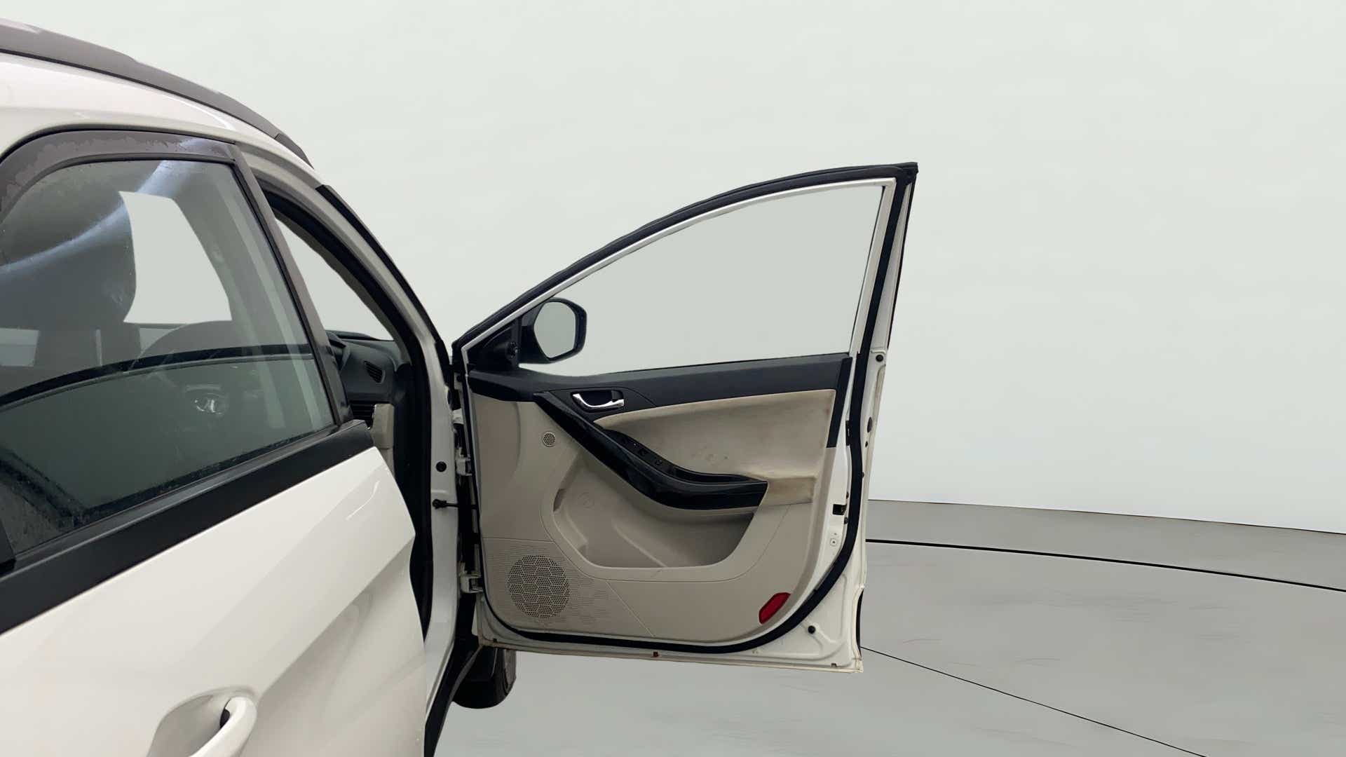 Driver side door interior of a Tata Nexon 2017-2023