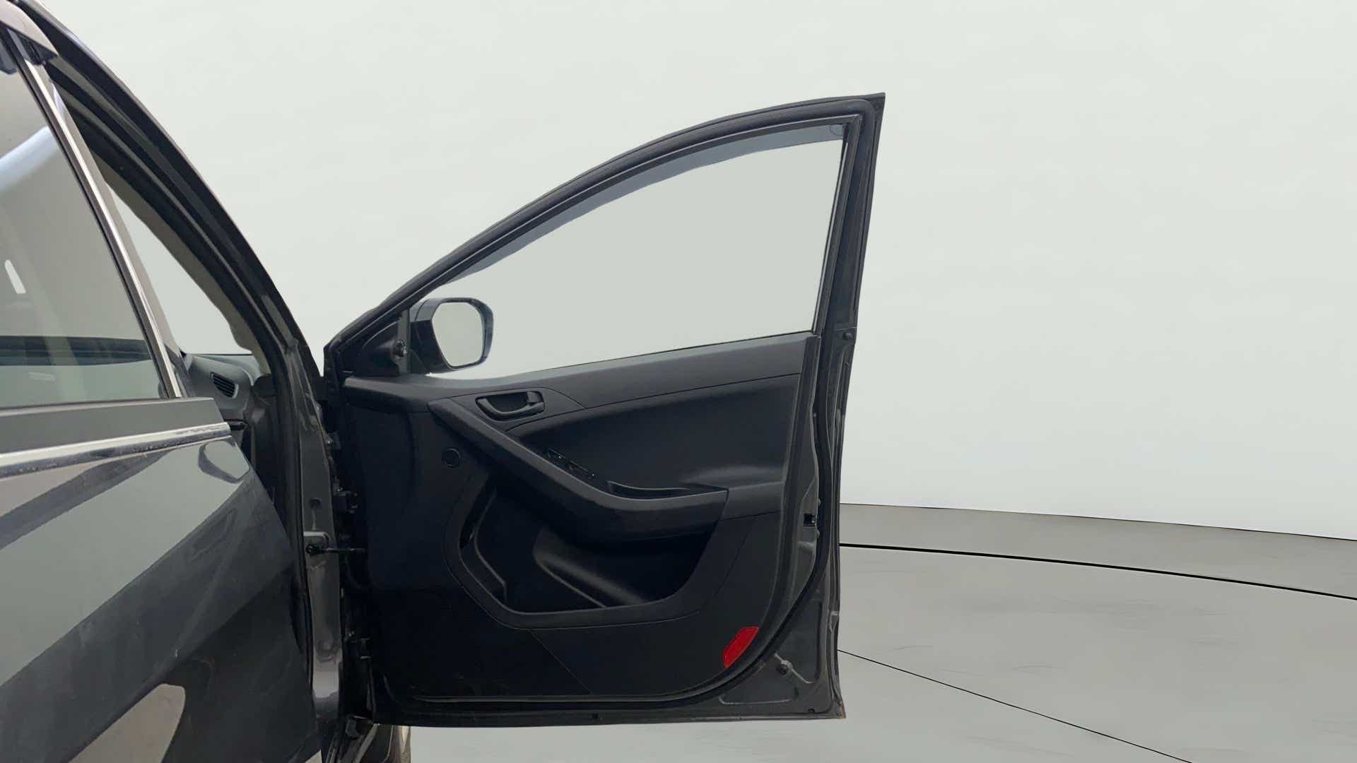 Front driver side door interior of a Tata Nexon