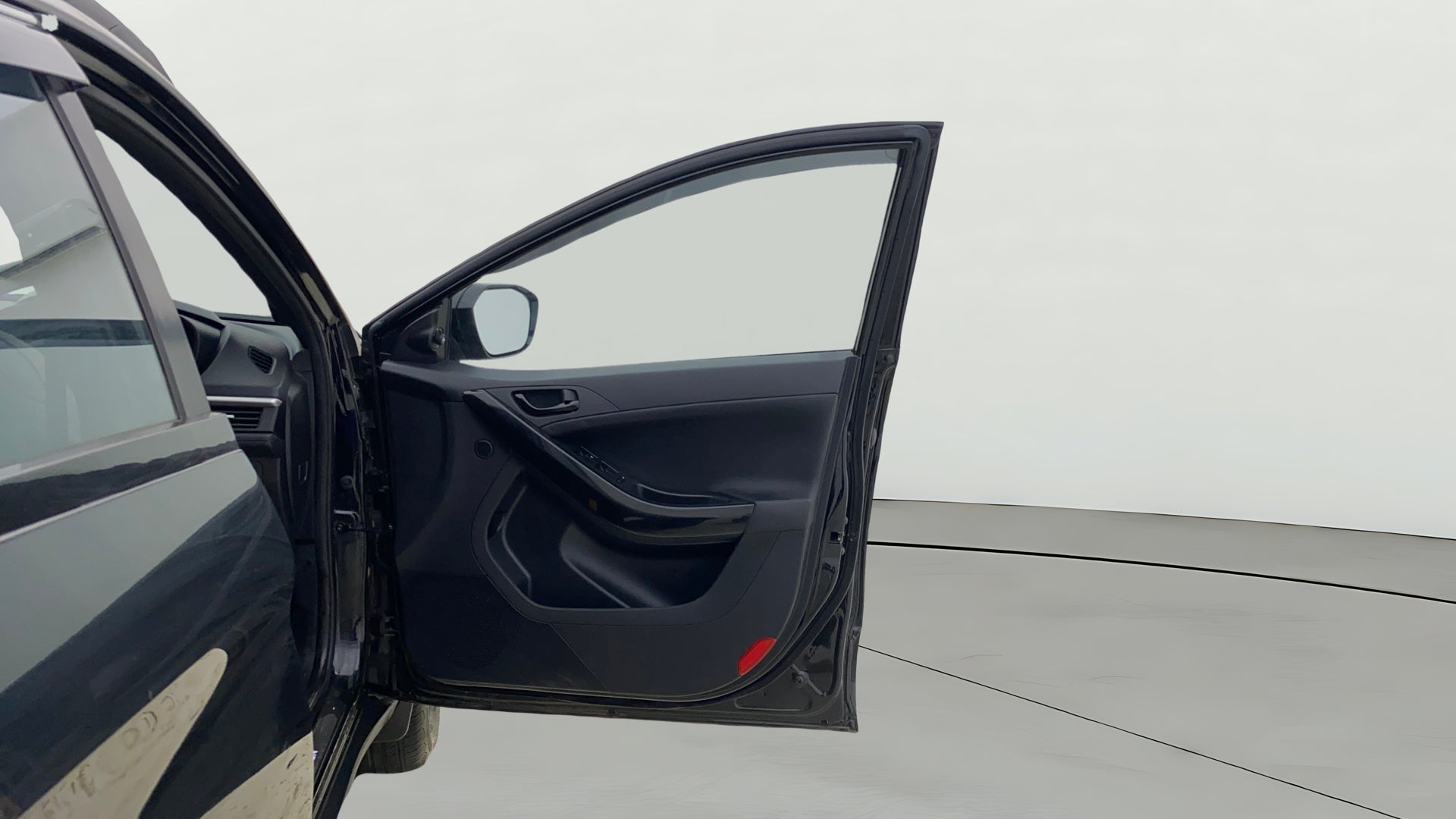 Driver door interior of a Tata Nexon