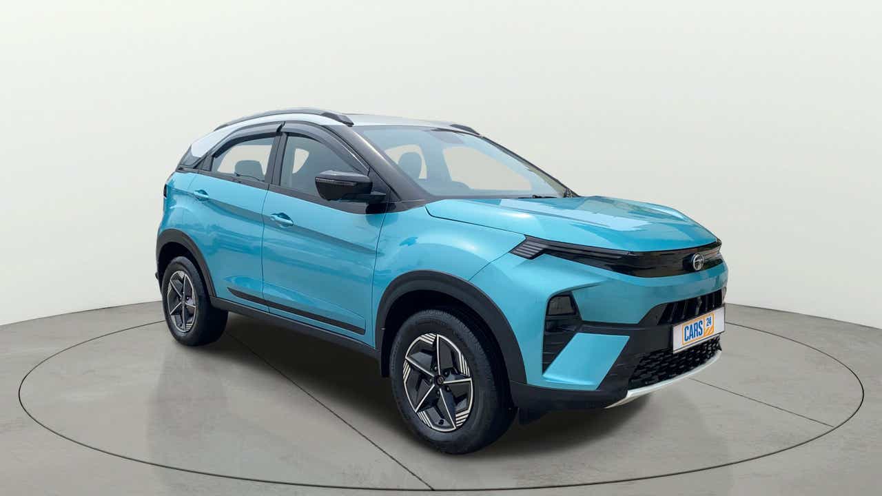 Front three-quarter view of a Tata Nexon