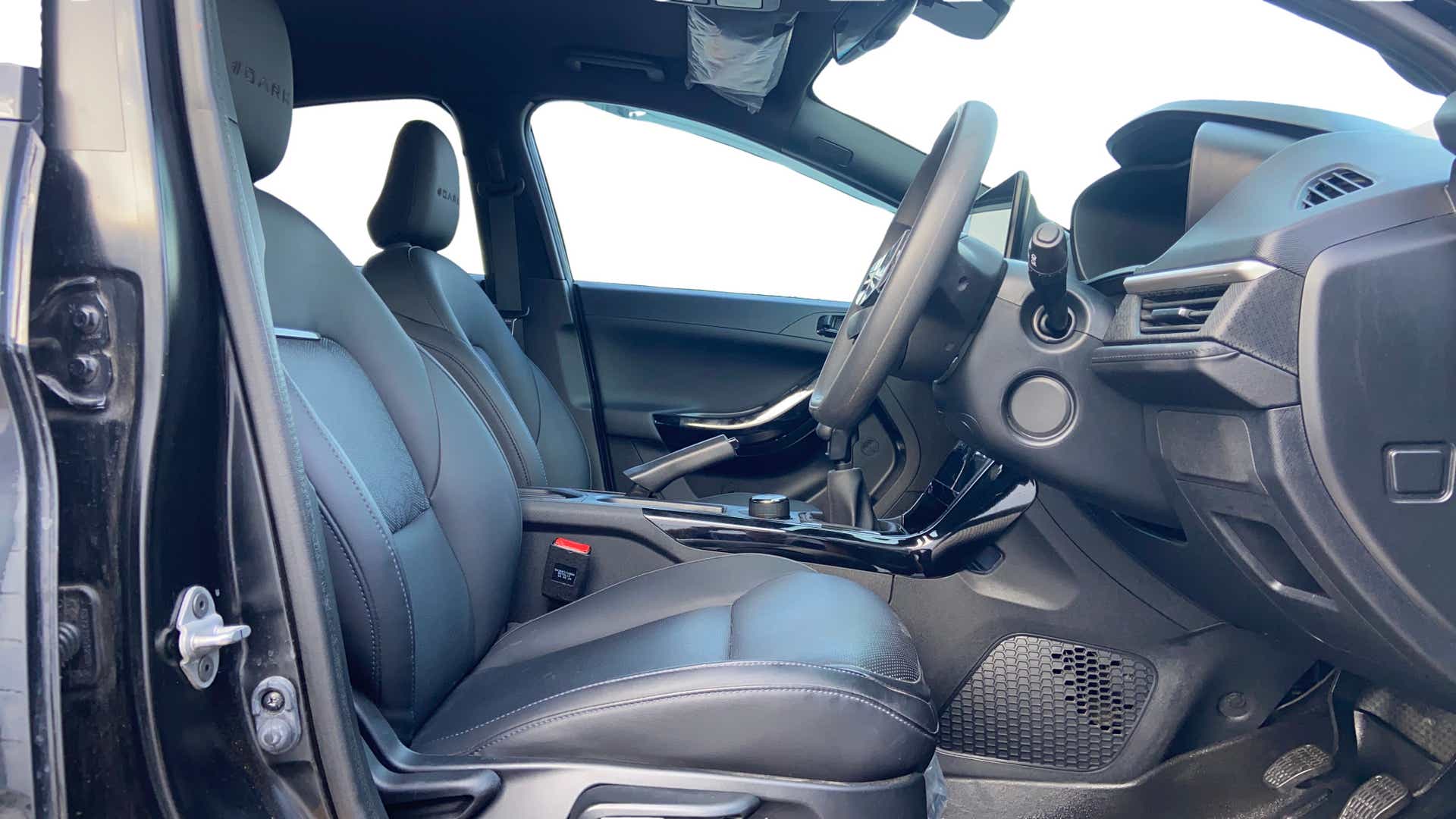Front seat and dashboard view of a Tata Nexon