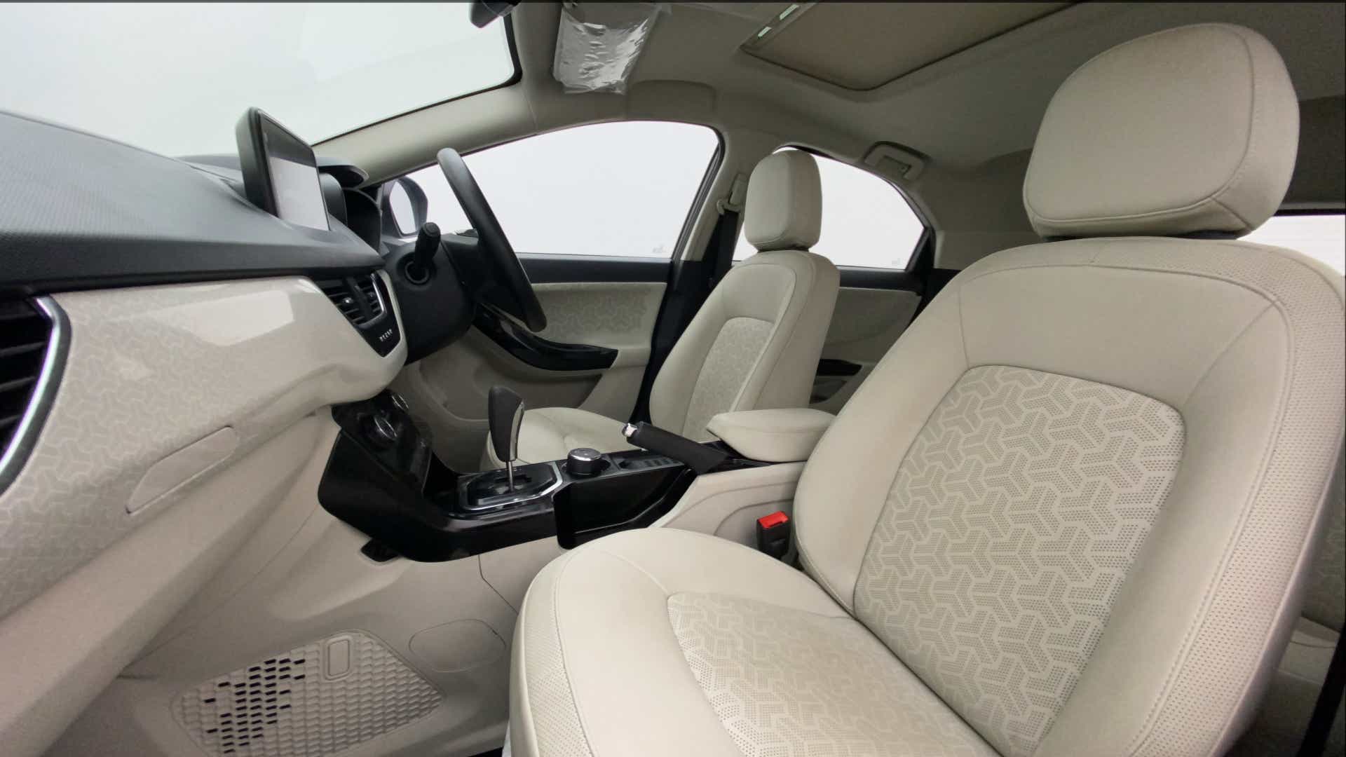 Interior front seats and dashboard of a Tata Nexon 2017-2023