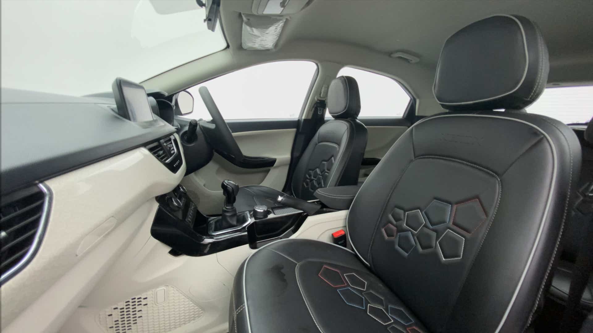Interior front seats view of a Tata Nexon 2017-2023