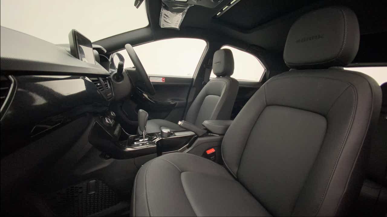 Interior front seats and dashboard of a Tata Nexon 2017-2023