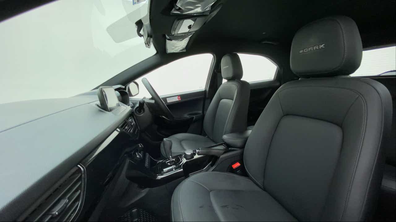 Interior front seats and dashboard of a Tata Nexon 2017-2023