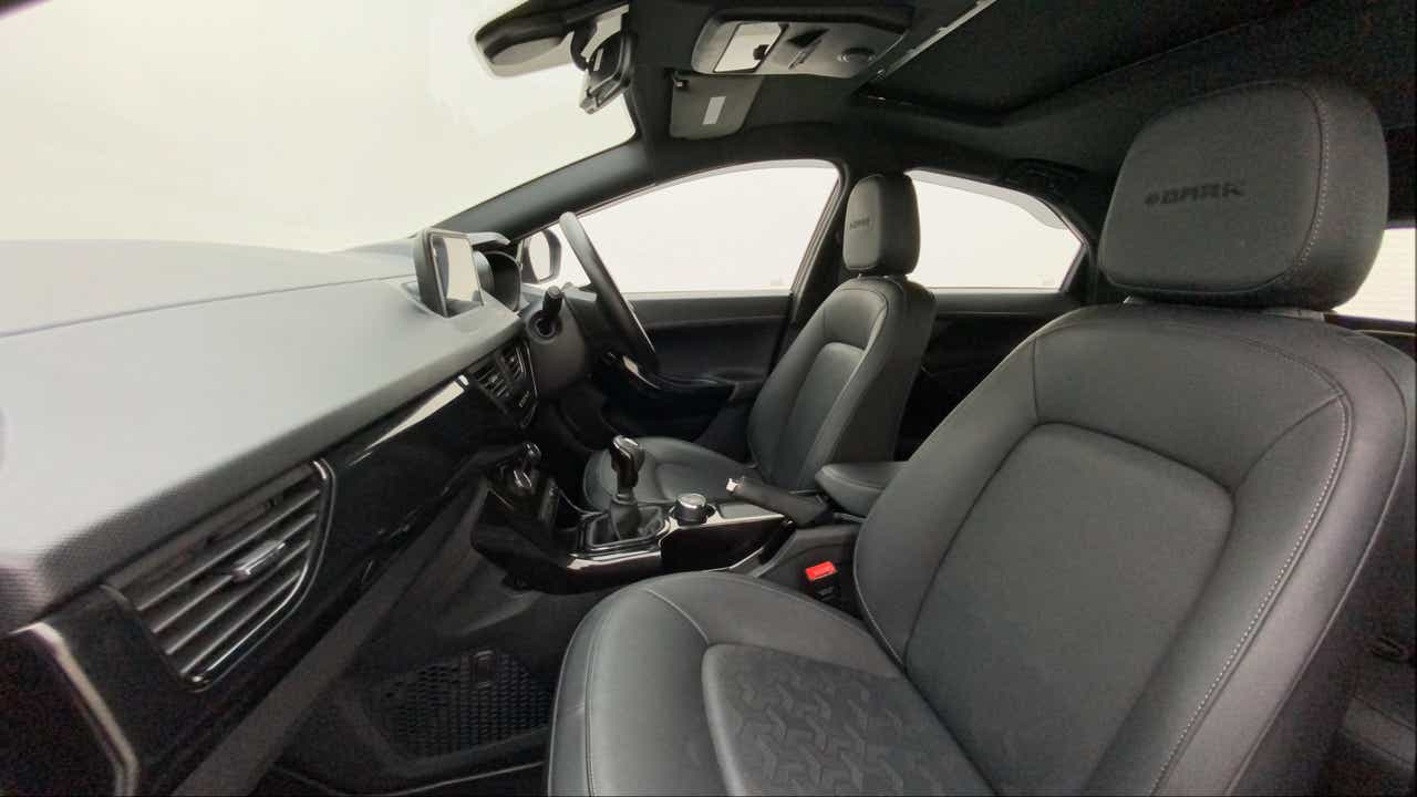 Interior dashboard and front seats view of a Tata Nexon 2017-2023