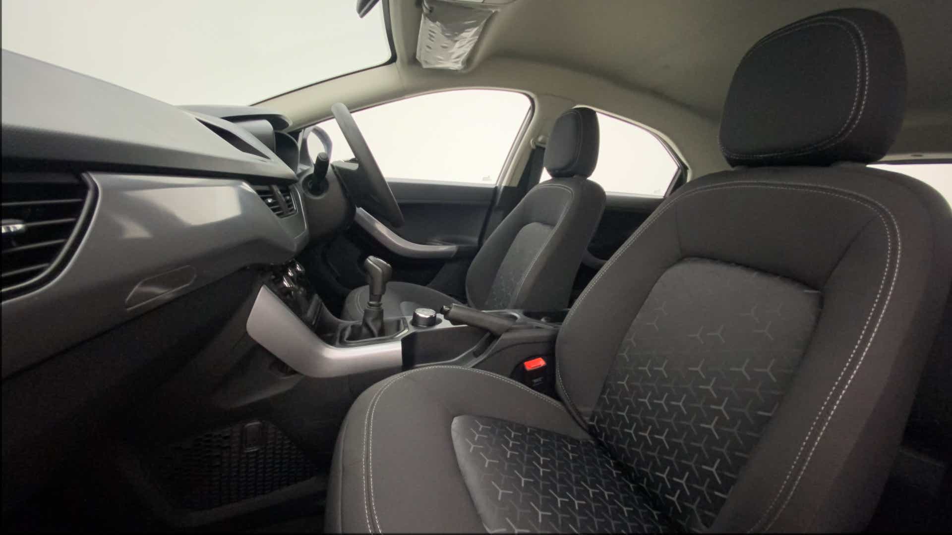 Interior dashboard and front seats of a Tata Nexon 2017-2023