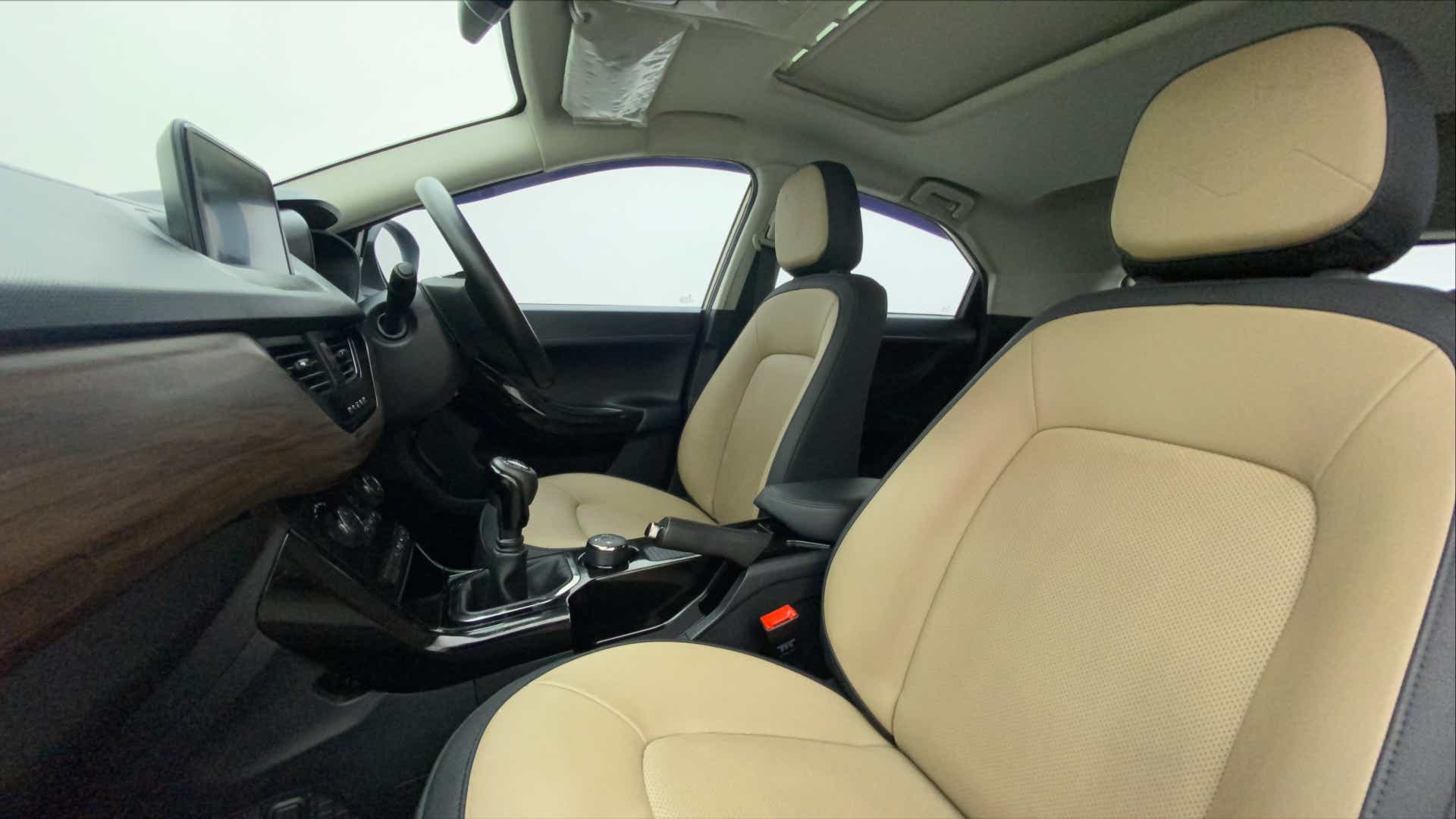 Front seats and dashboard of a Tata Nexon 2017-2023
