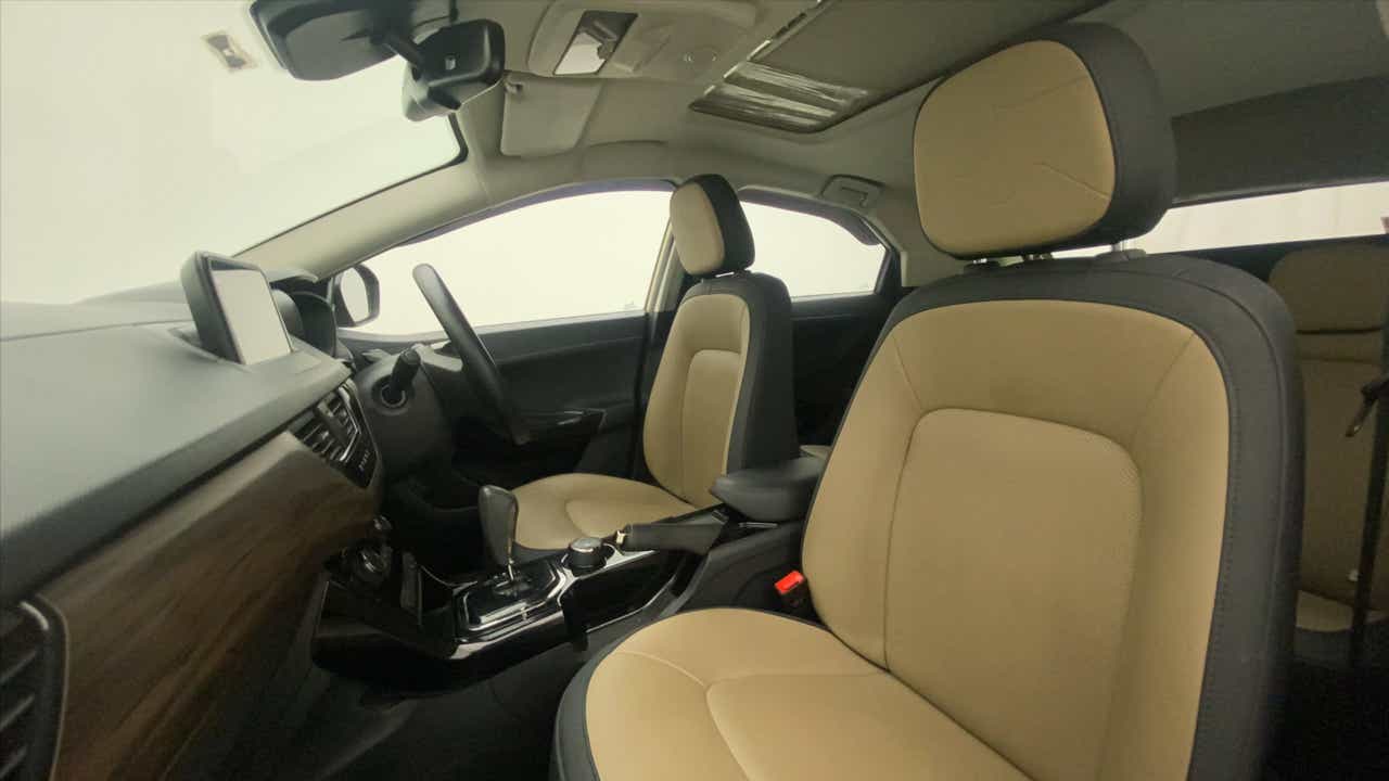 Interior dashboard and front seats of a Tata Nexon 2017-2023