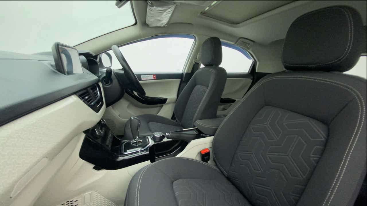 Interior dashboard and front seats of a Tata Nexon 2017-2023