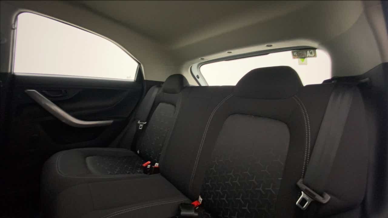 Rear seat and side door view of a Tata Nexon 2017-2023