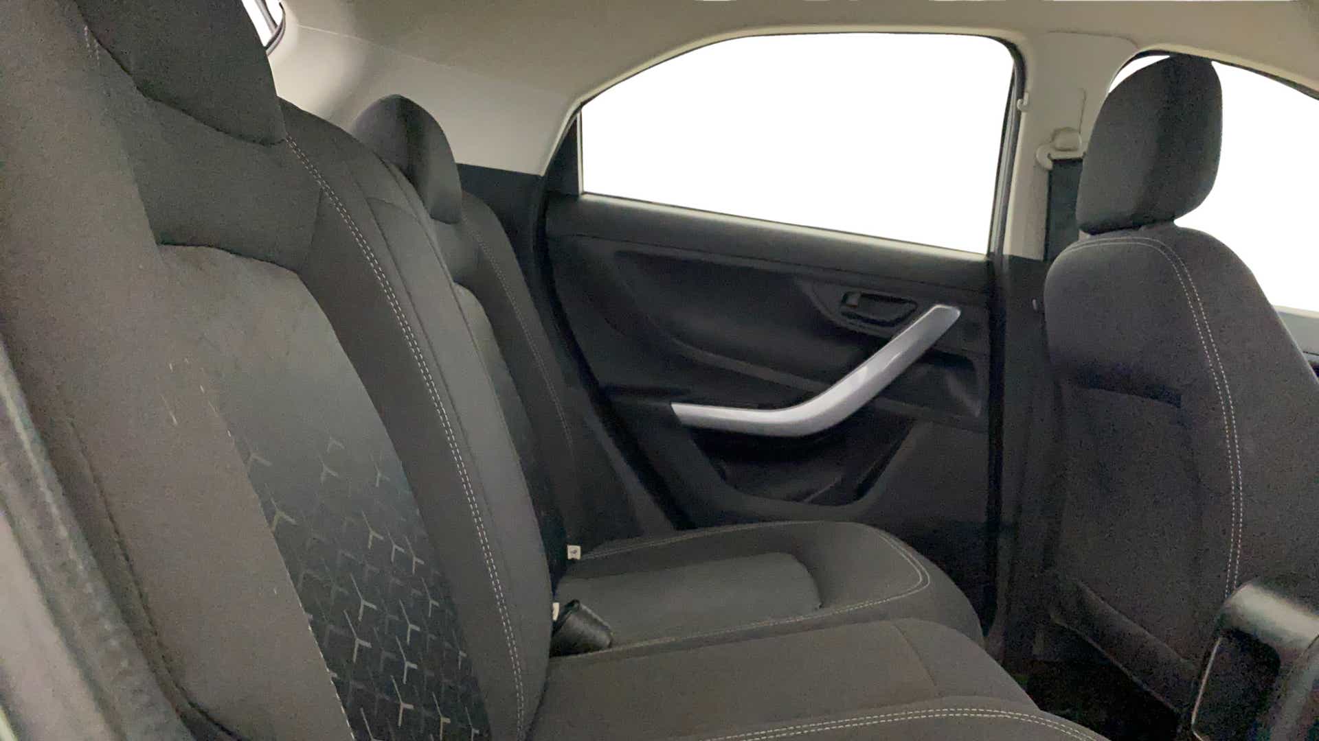 Rear seat and door panel view of a Tata Nexon 2017-2023