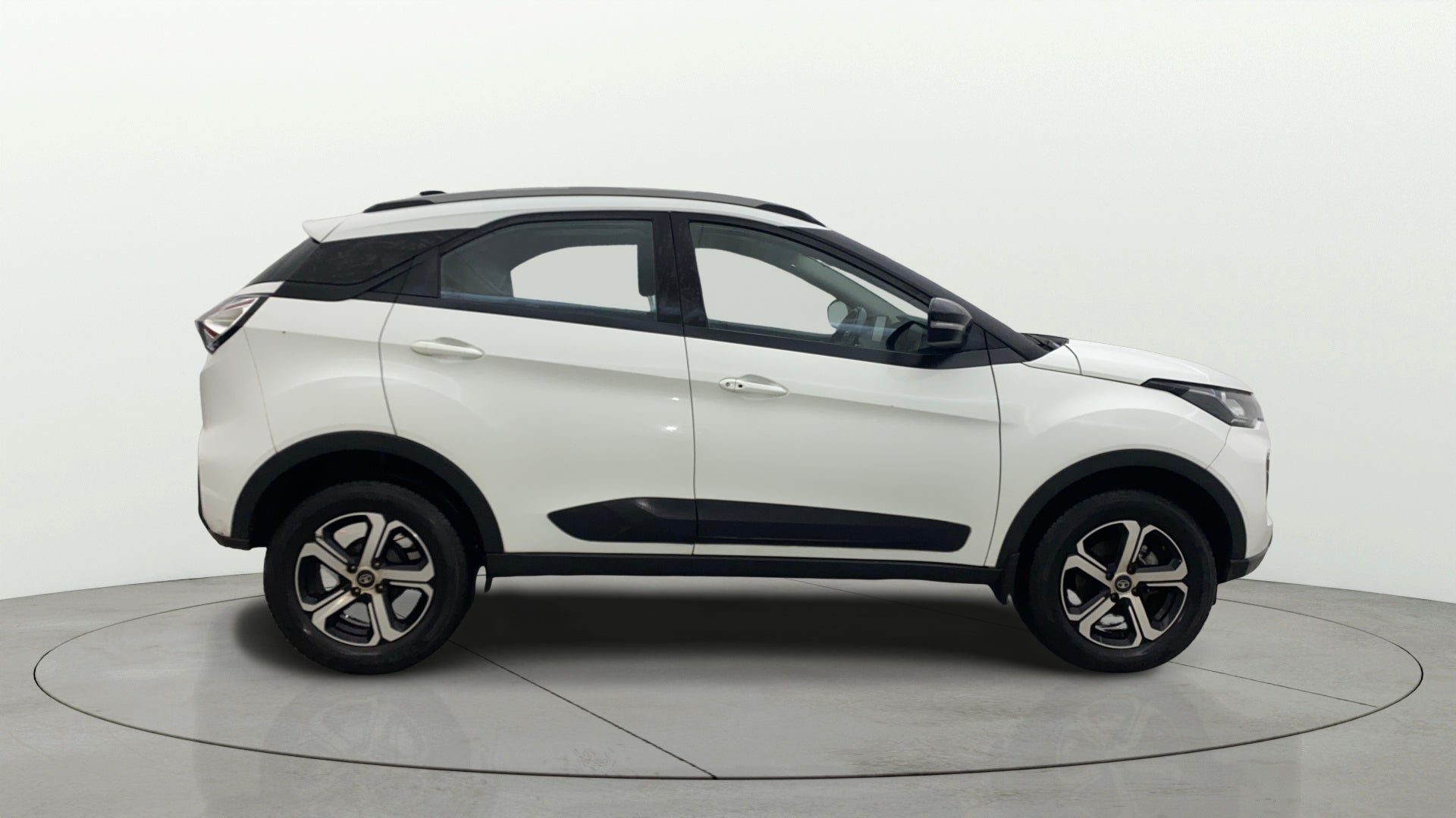 Side view of a Calgary White Tata Nexon 2017-2023