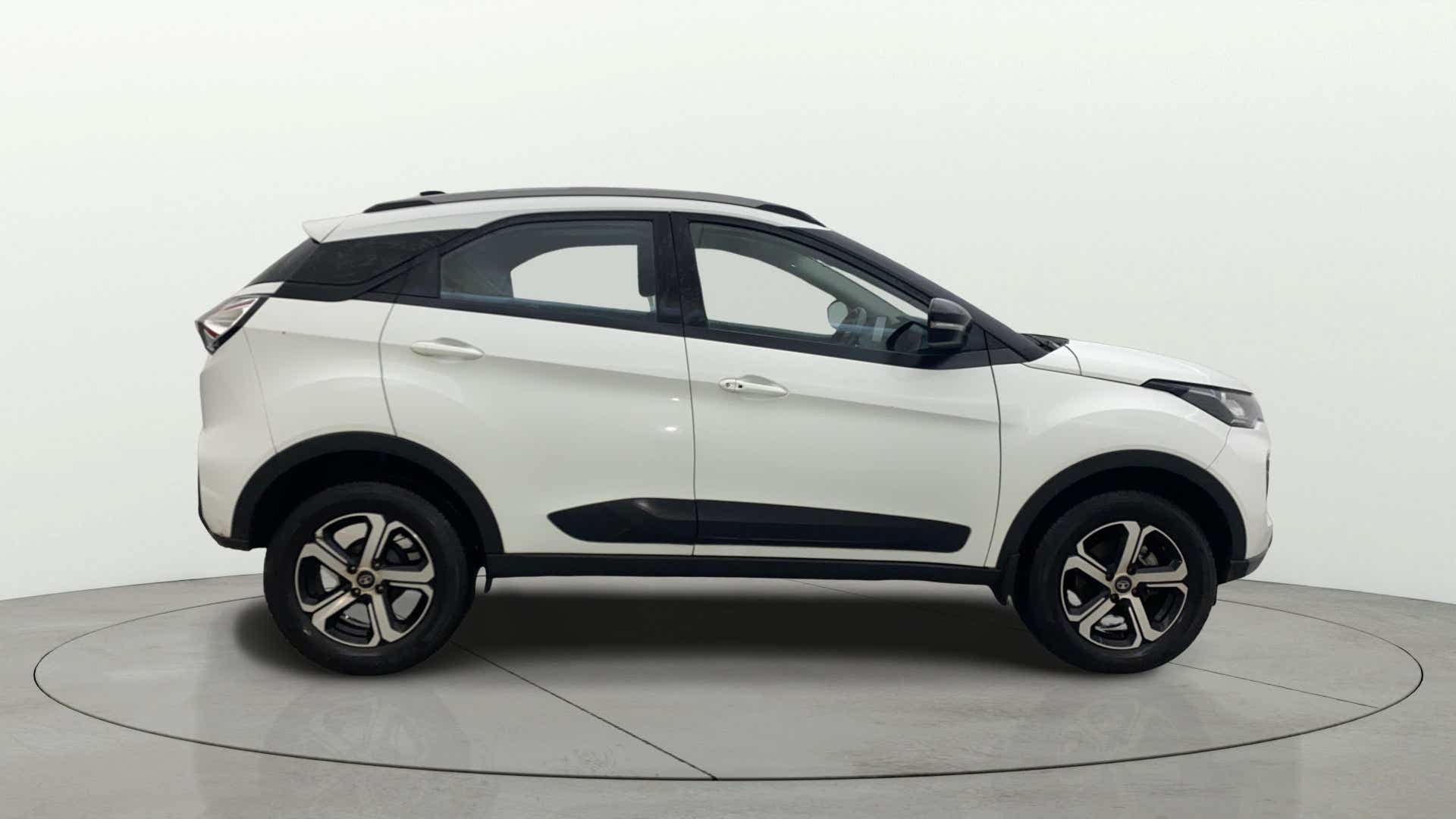 Side view of a Calgary White Tata Nexon 2017-2023