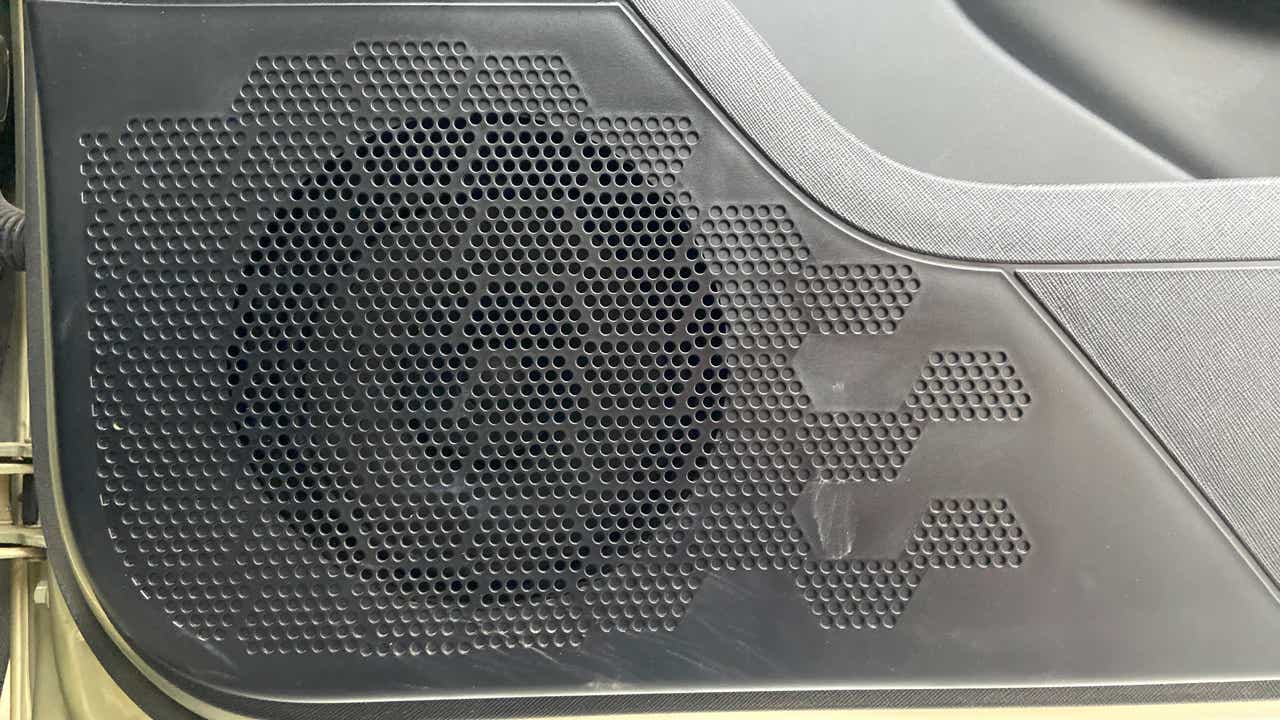 Close-up of a speaker grille in a Tata Nexon 2017-2023