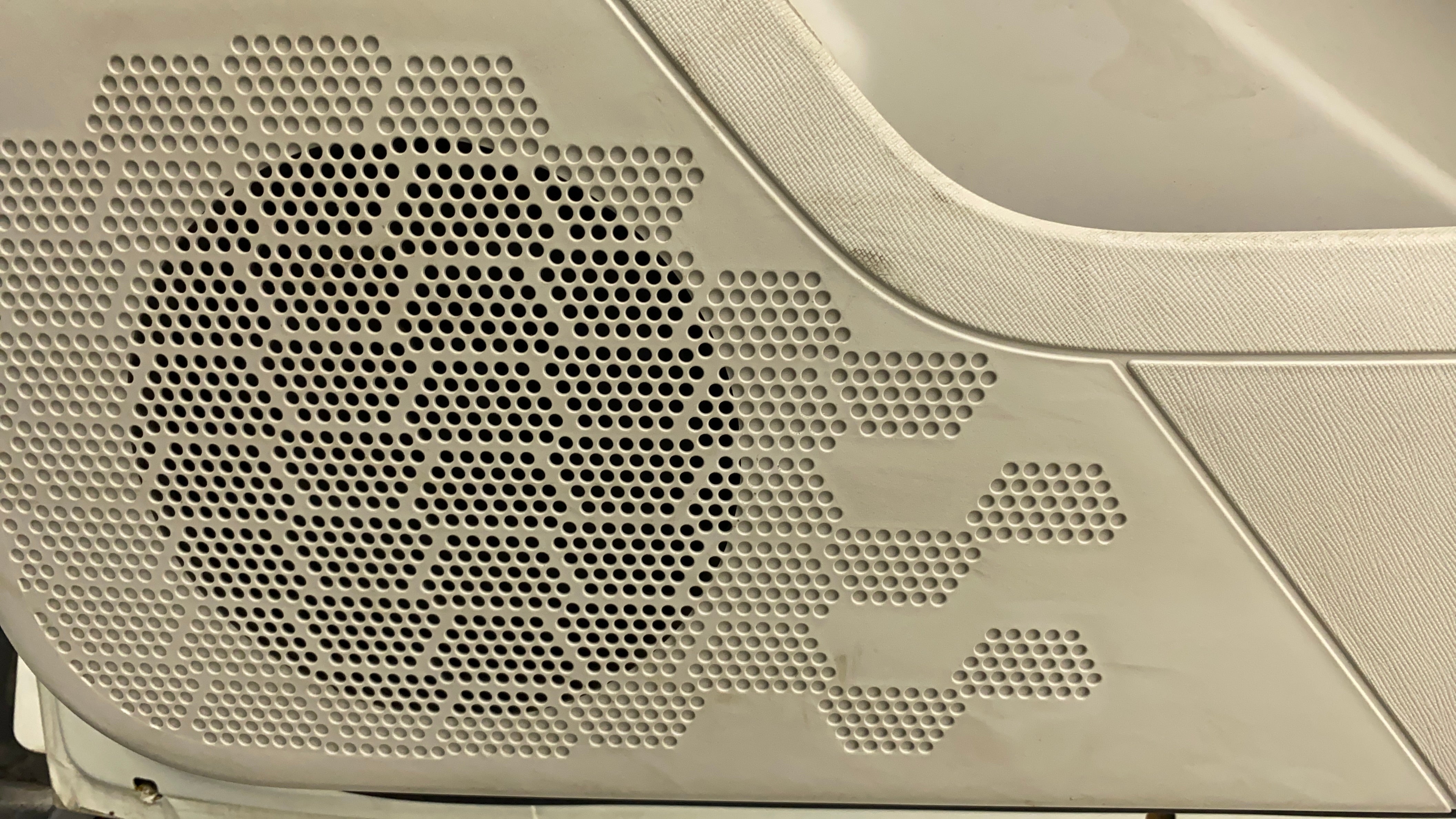 Close-up of the speaker grille in a Tata Nexon 2017-2023