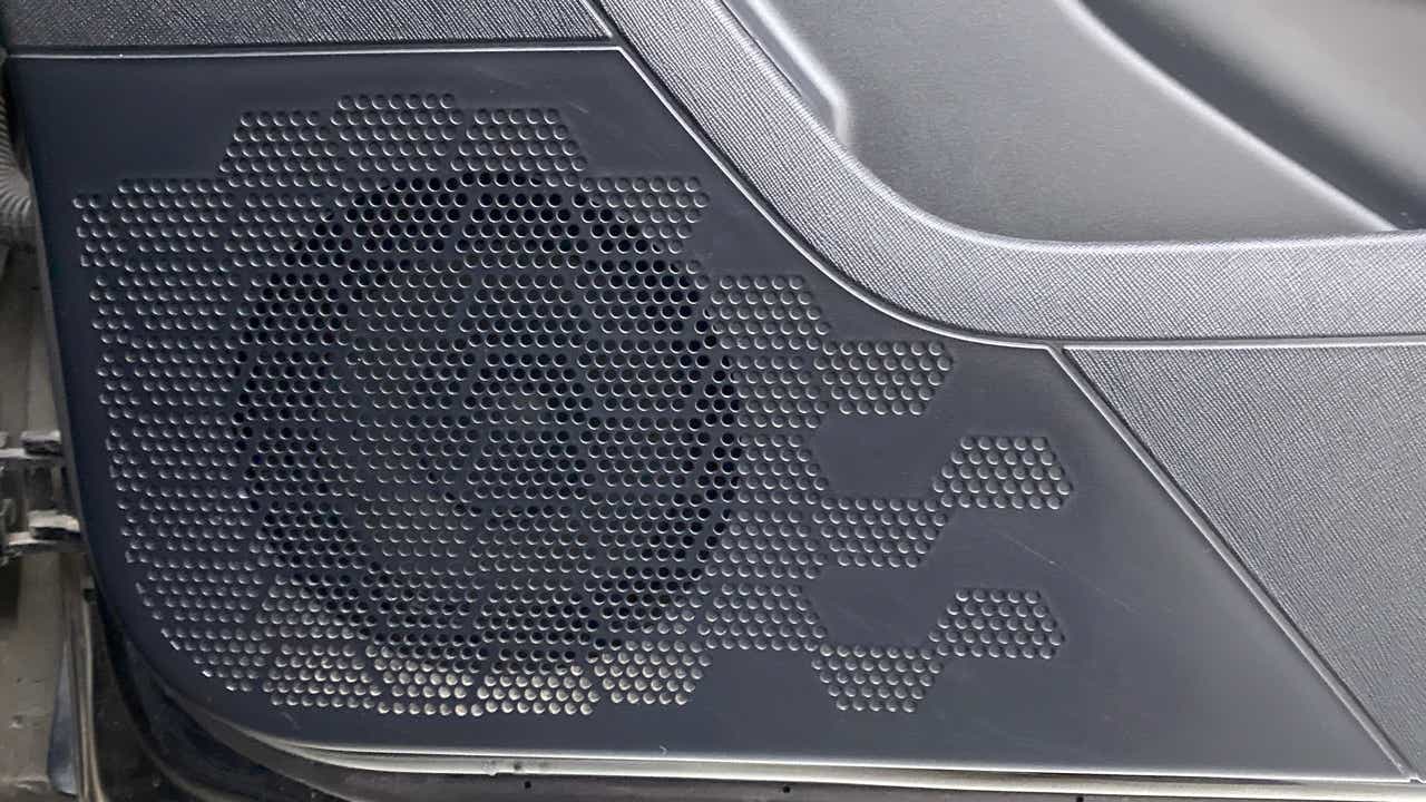 Front door panel speaker grille of a Tata Nexon 2017-2023