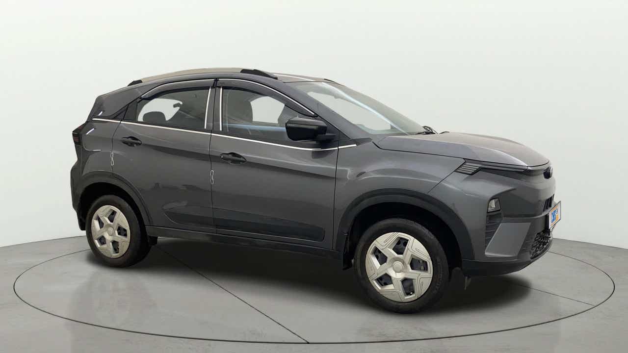 Side view of a daytona grey Tata Nexon