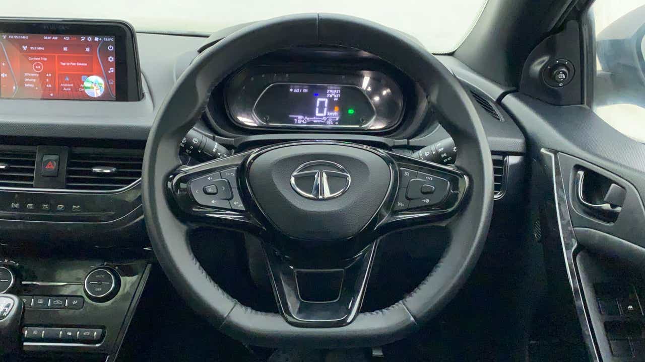 Steering wheel and dashboard of a Tata Nexon 2017-2023