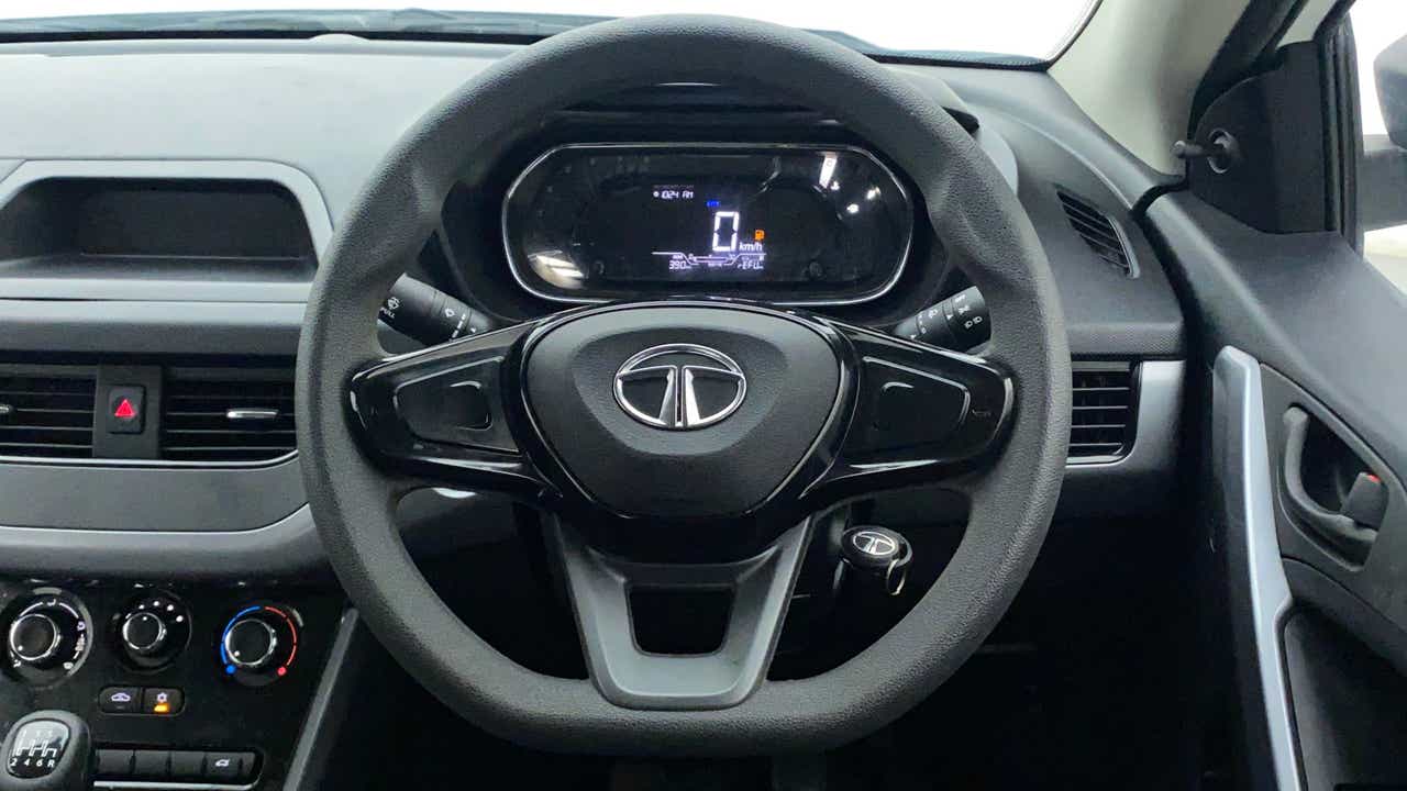 Interior dashboard and steering wheel of a Tata Nexon 2017-2023