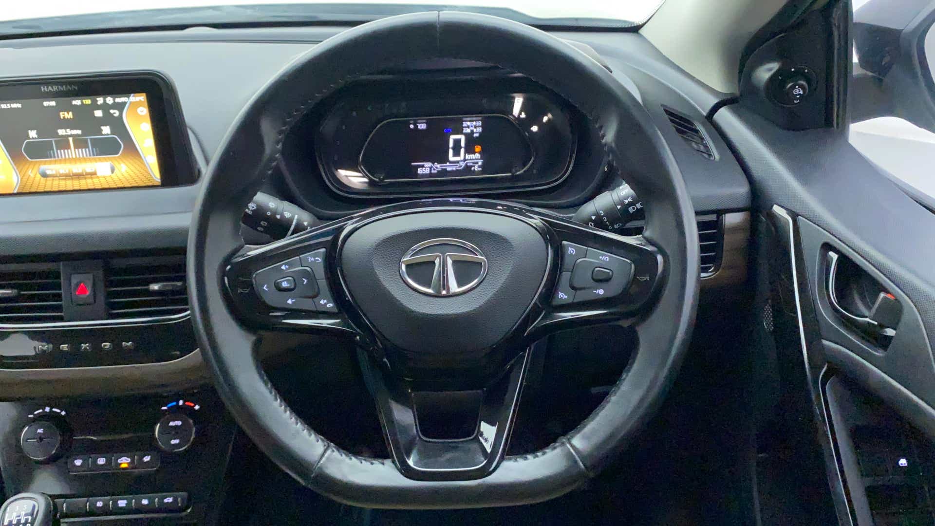 Interior steering wheel and dashboard of a Tata Nexon 2017-2023