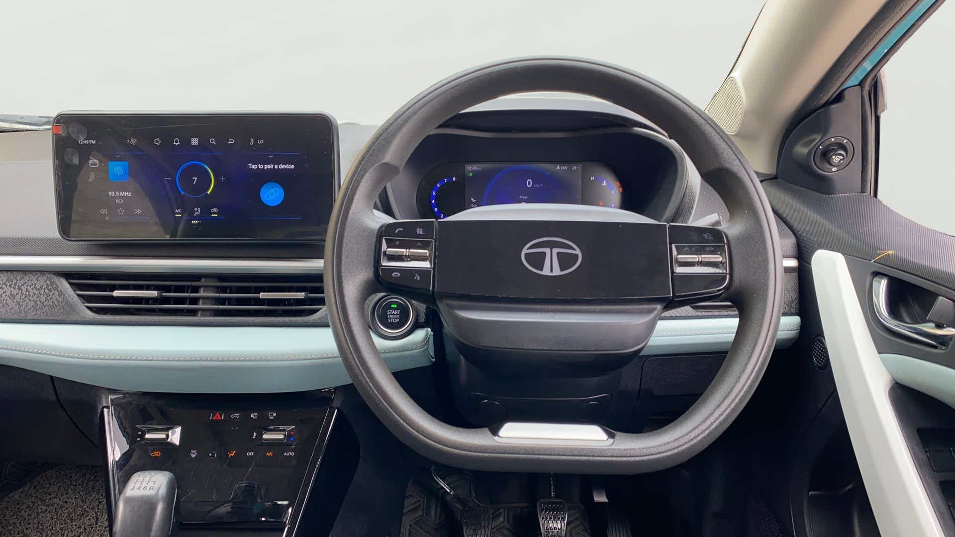 Dashboard and steering wheel view of a Tata Nexon