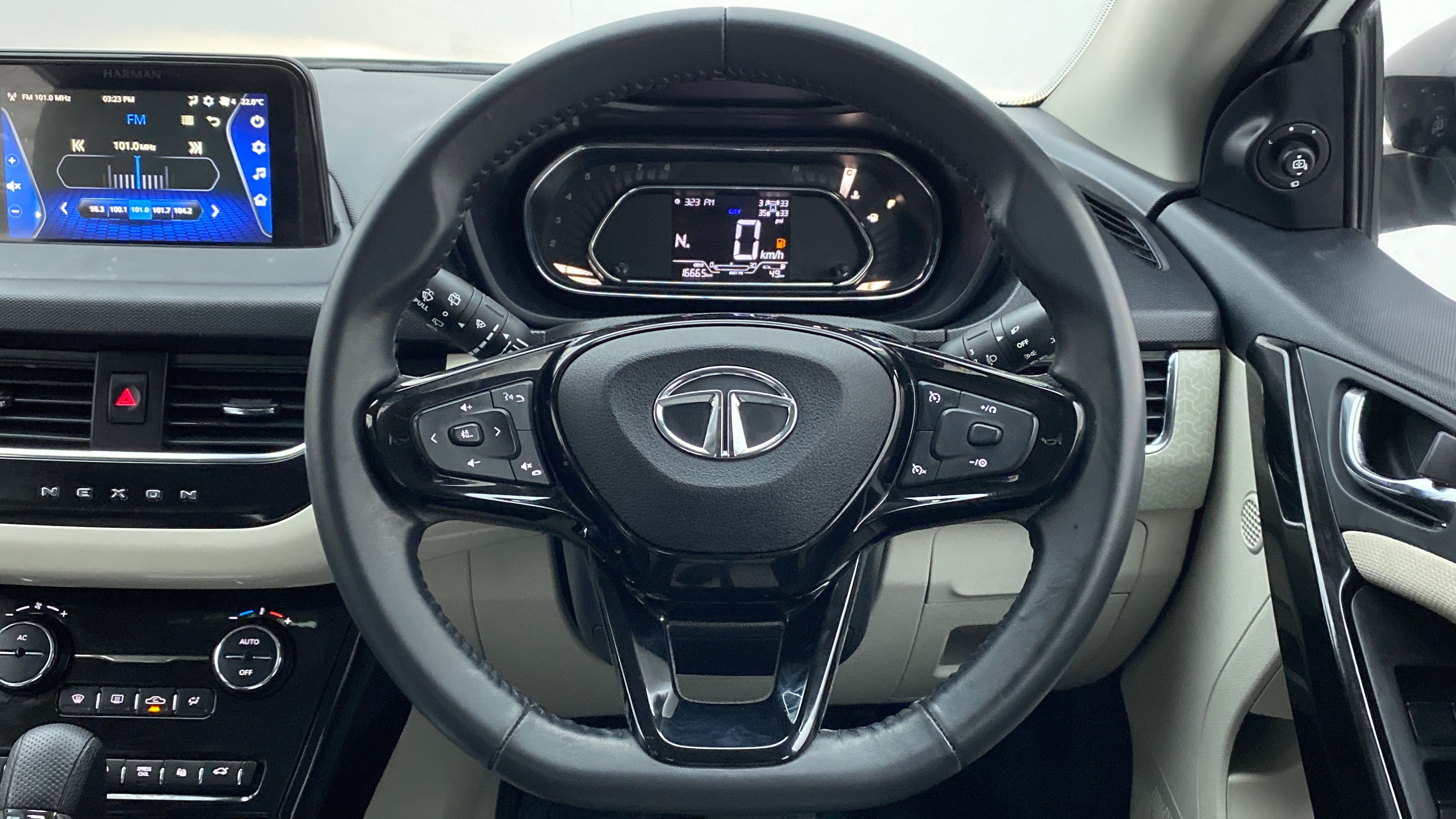 Interior dashboard and steering wheel of a Tata Nexon 2017-2023