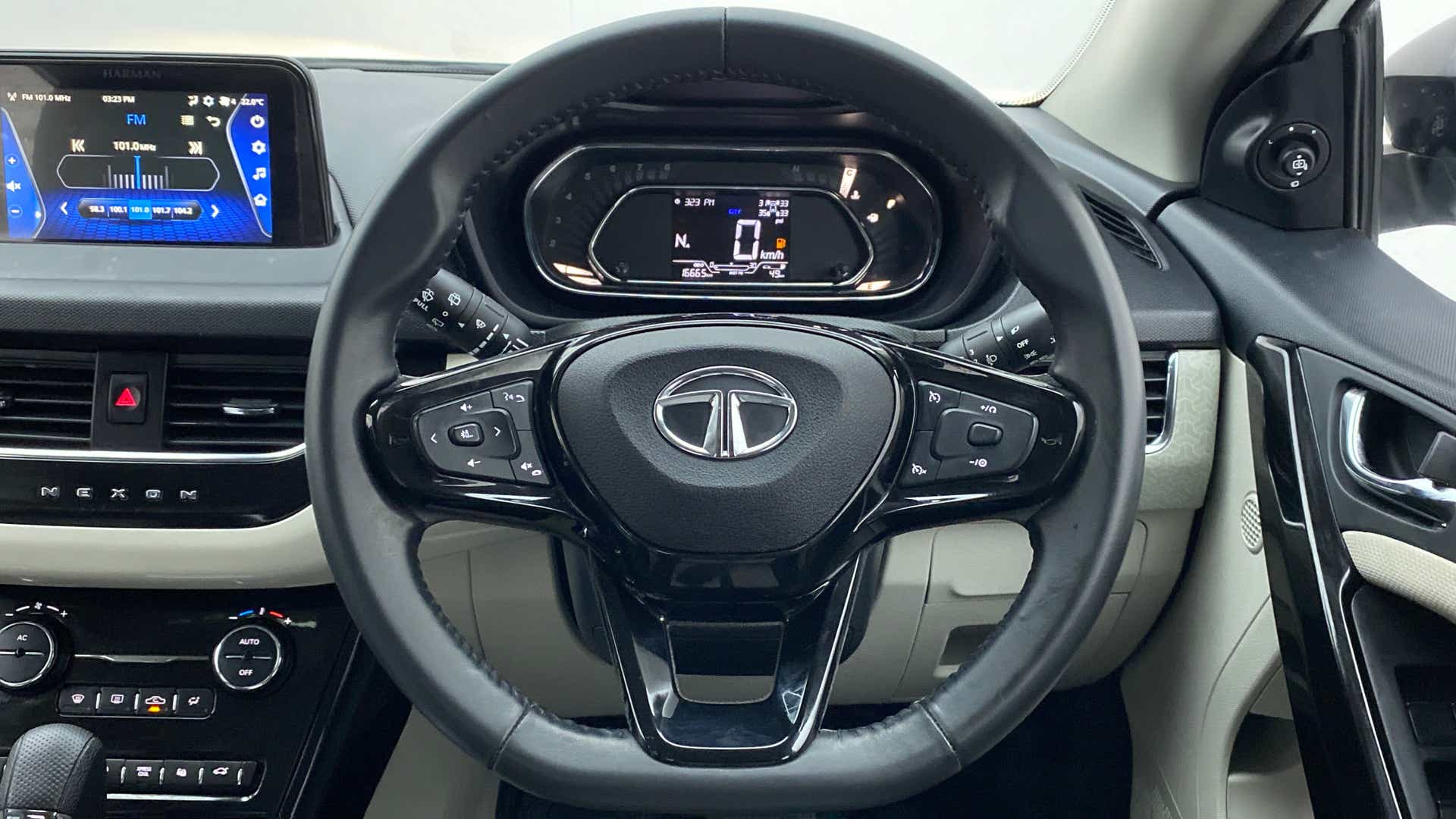 Interior dashboard and steering wheel of a Tata Nexon 2017-2023