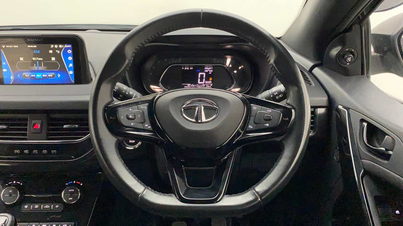 Steering wheel and dashboard of a Tata Nexon 2017-2023