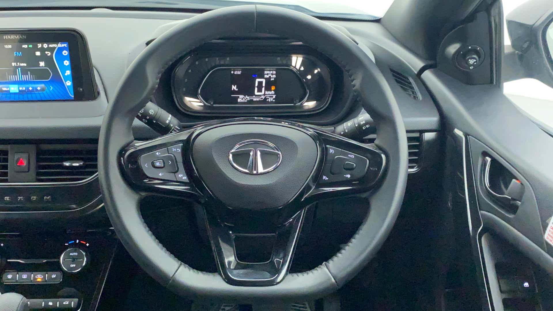 Steering wheel and dashboard of a Tata Nexon 2017-2023